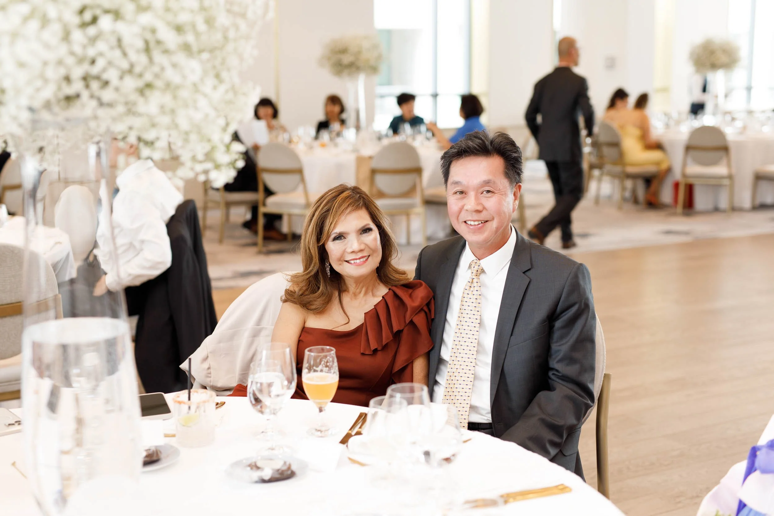 Couple seated together during a Pearle Hotel wedding reception in Burlington Ontario