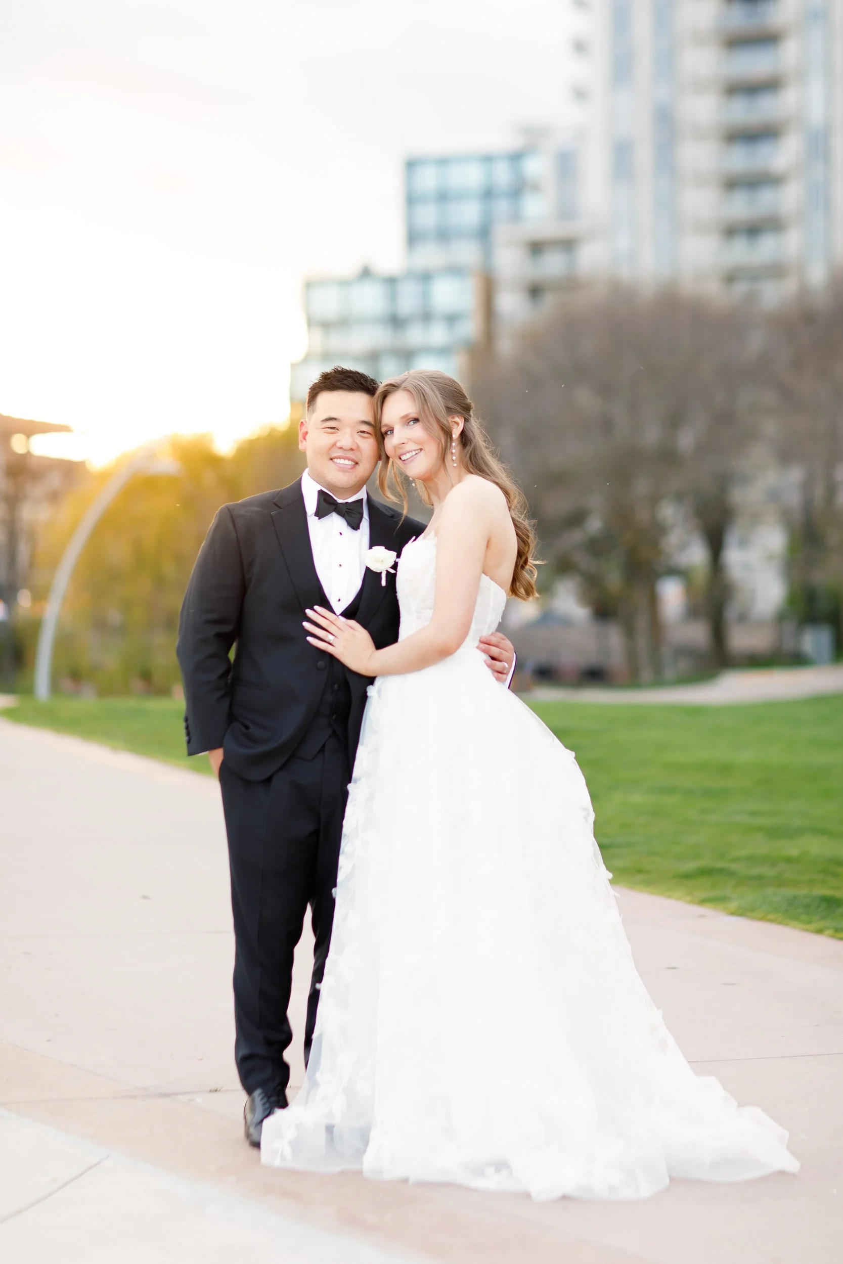 Bride and groom walking together outside the Pearle Hotel in Burlington Ontario