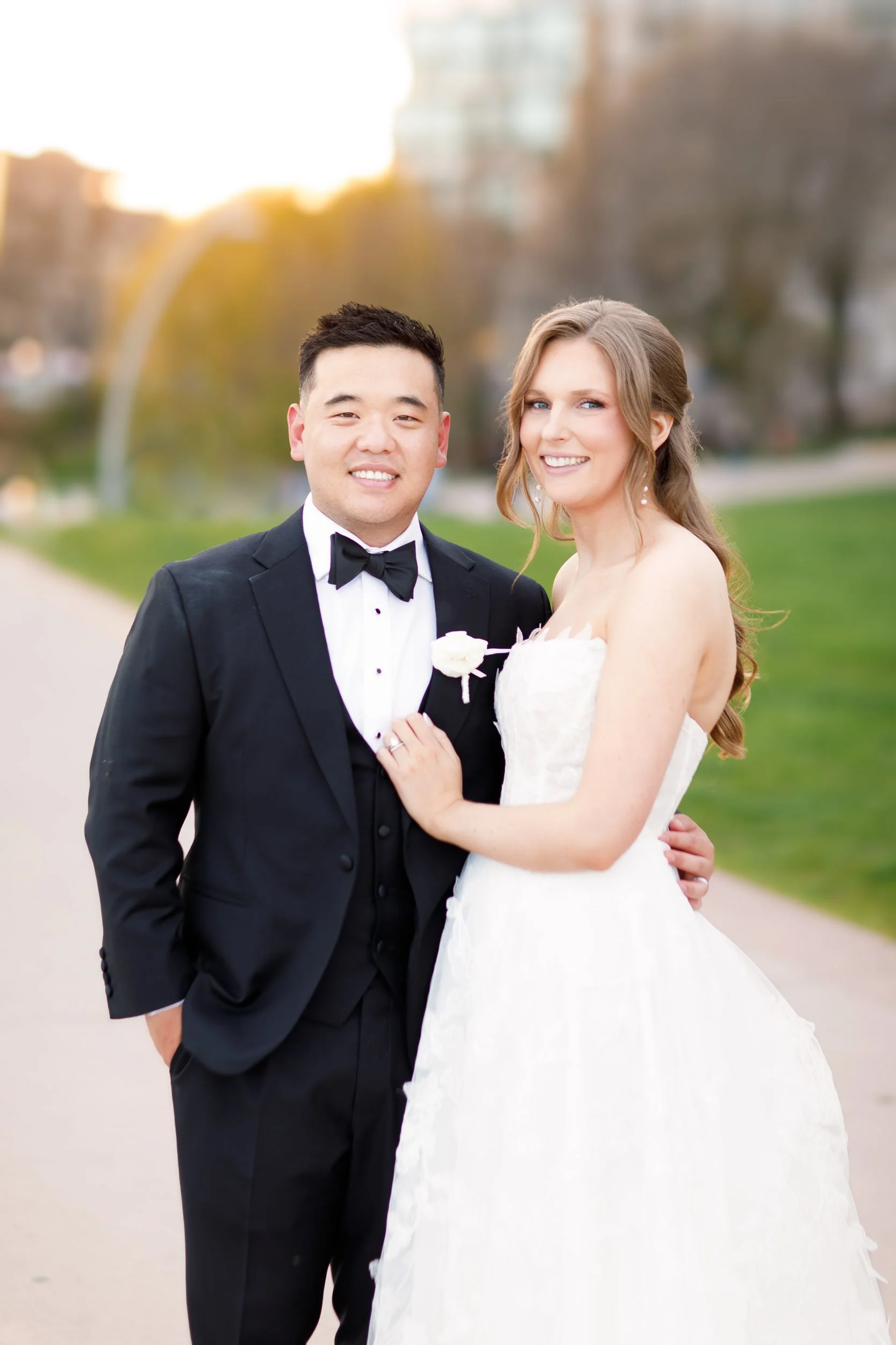 Bride and groom posing together outside the Pearle Hotel in Burlington Ontario