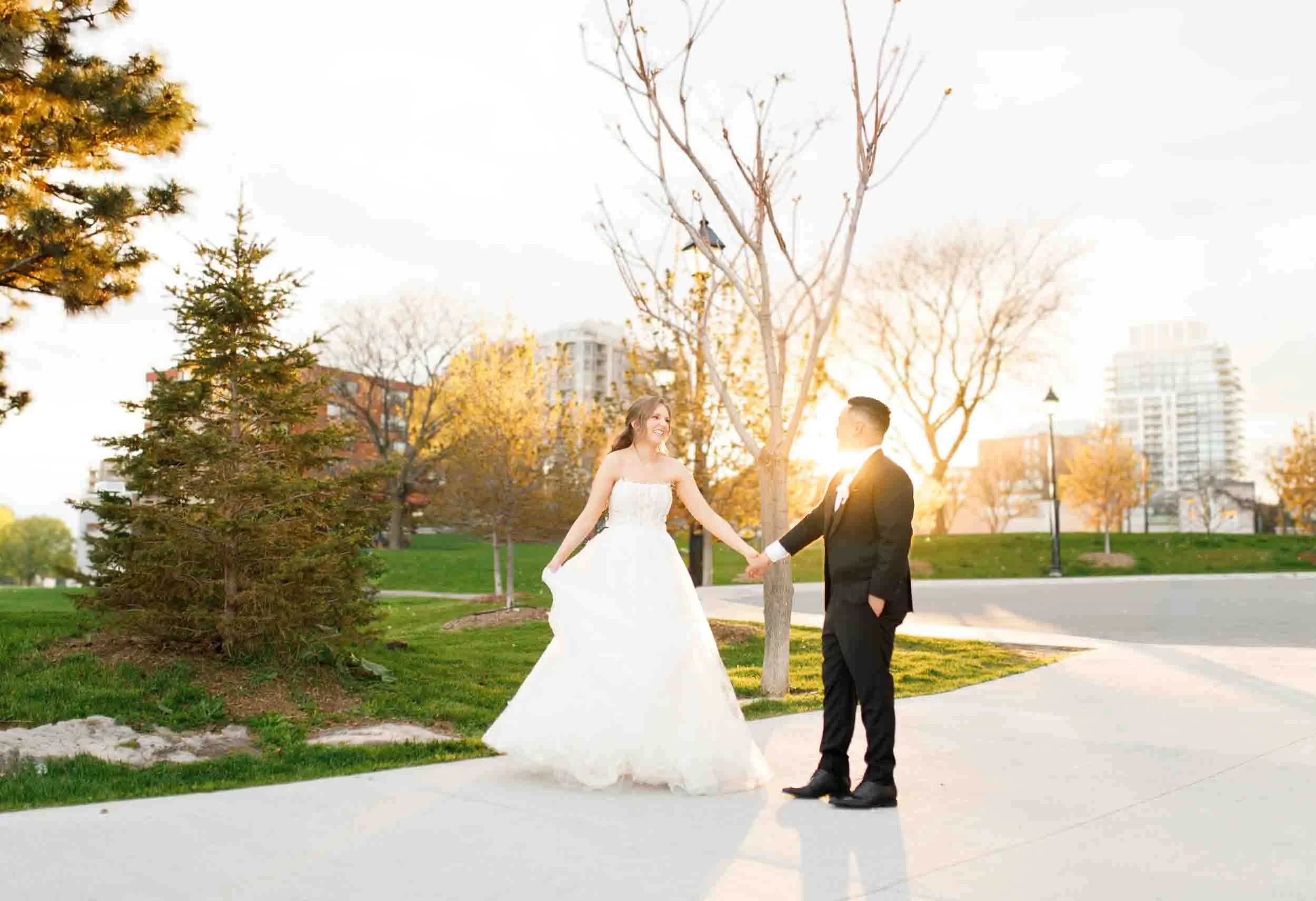 Bride and groom standing together during golden hour in Burlington Ontario