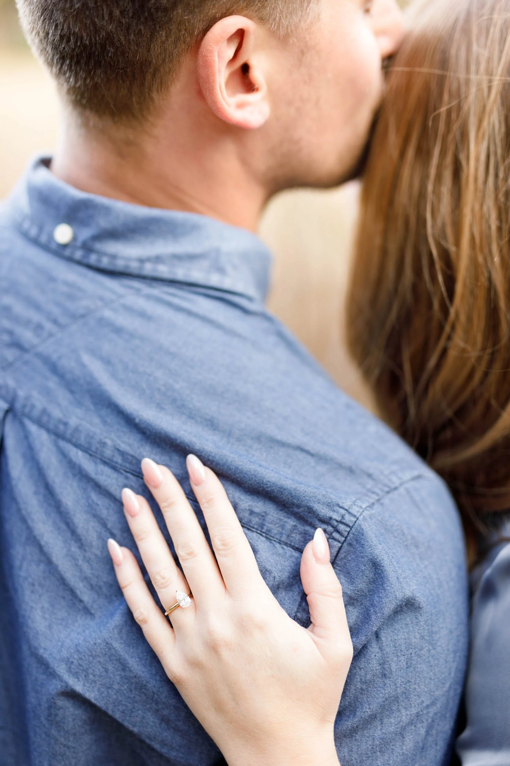 Close up of an engagement ring during a fall engagement session at Grindstone Marsh Trail in Burlington Ontario