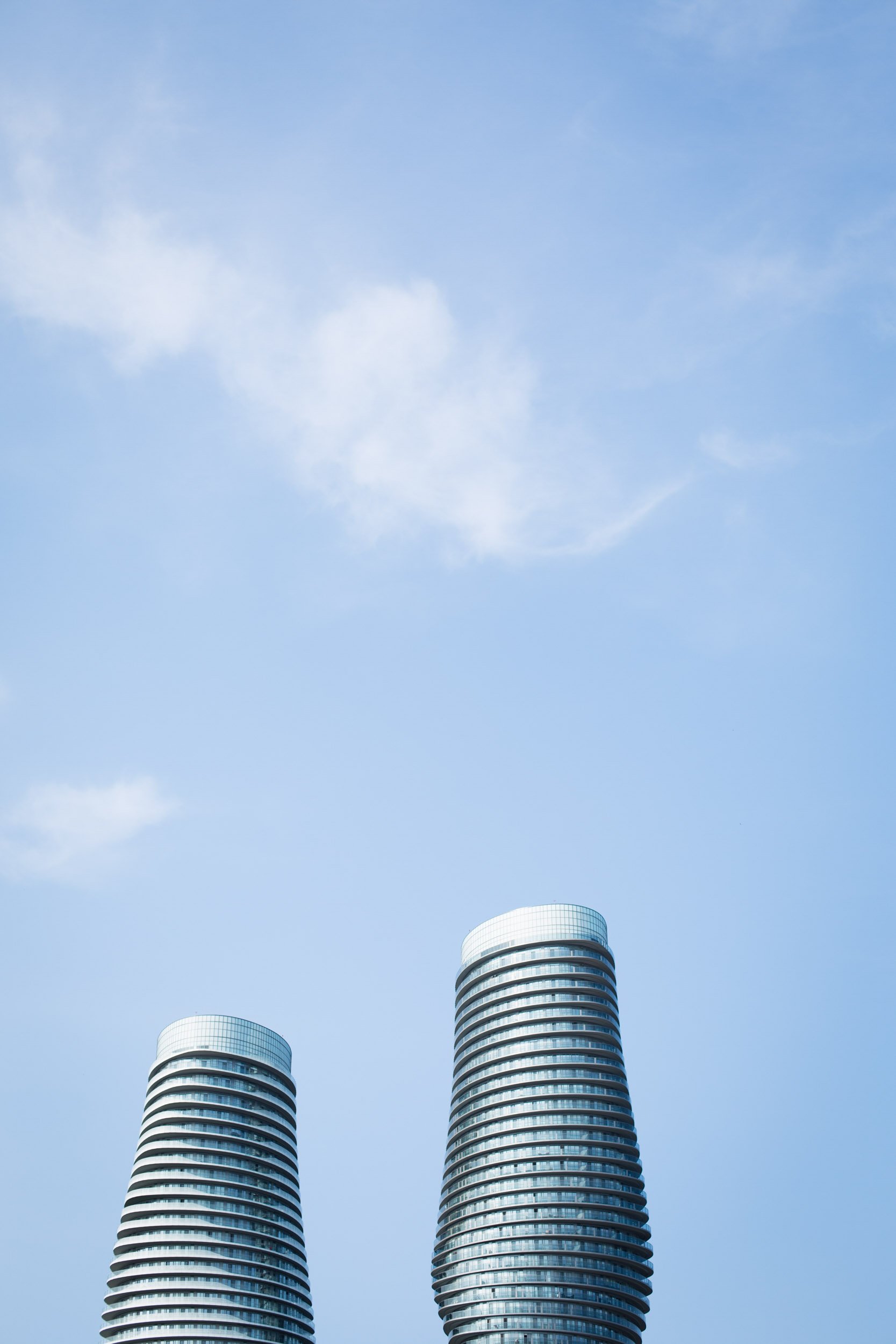 Modern Mississauga condominium towers photographed against a clear blue sky (Copy)
