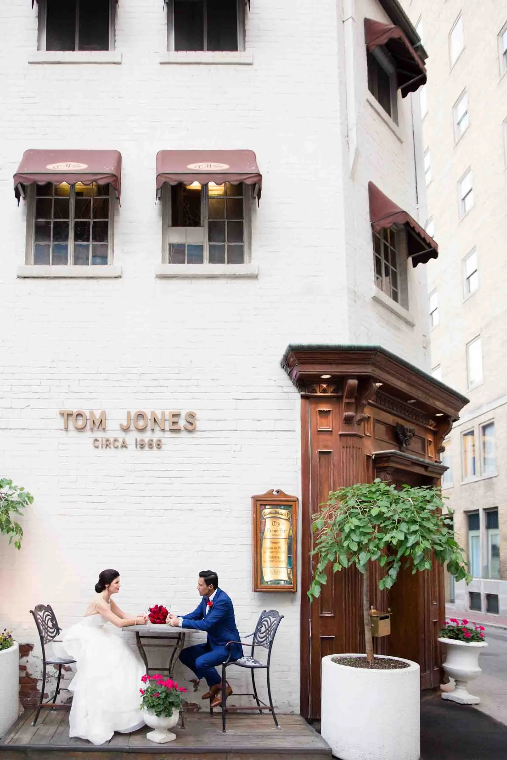 Wedding couple sharing a quiet moment outside the Omni King Edward Hotel in downtown Toronto (Copy)