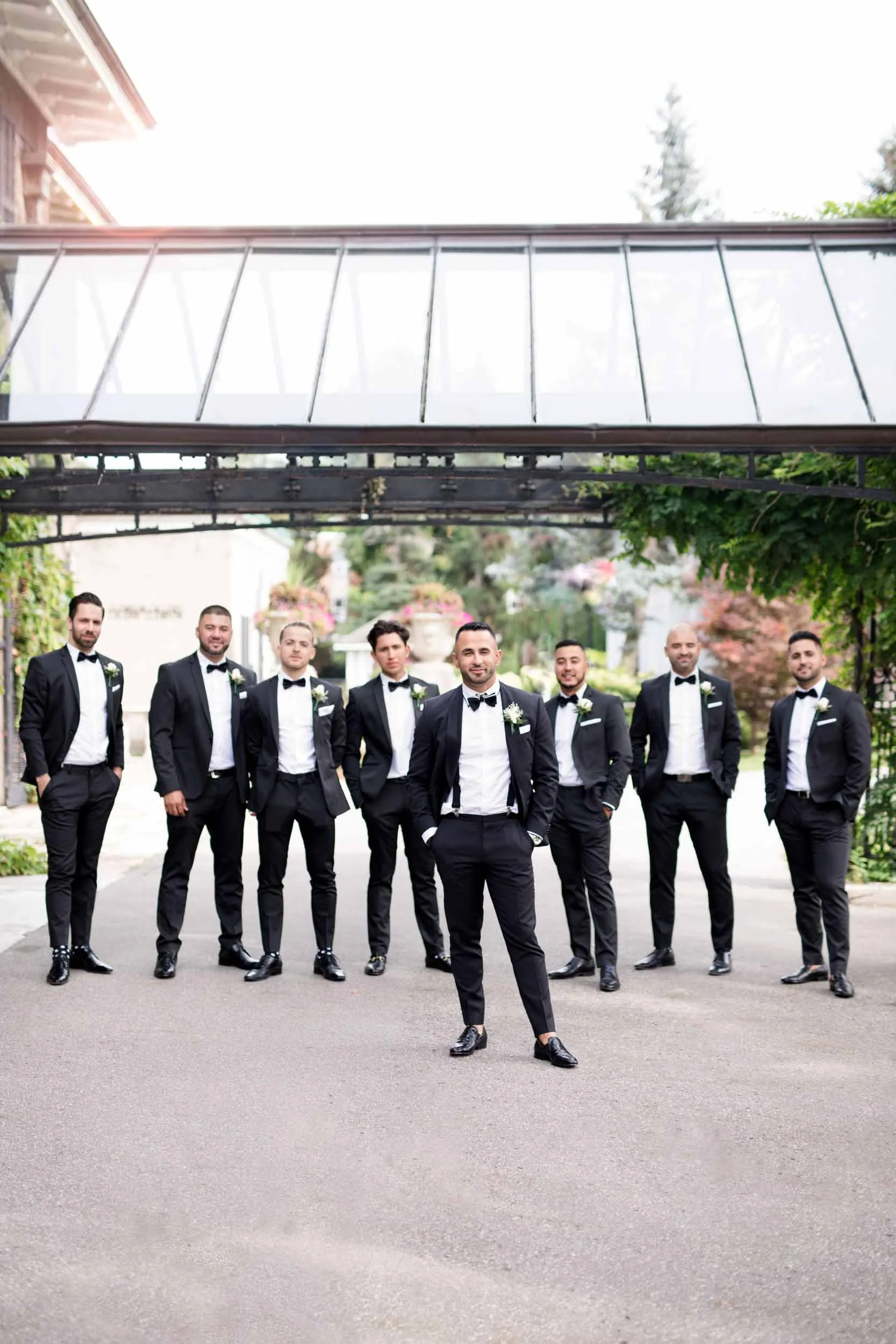 Groomsmen walking together in formalwear at Glendon Hall on York University’s Toronto campus (Copy)
