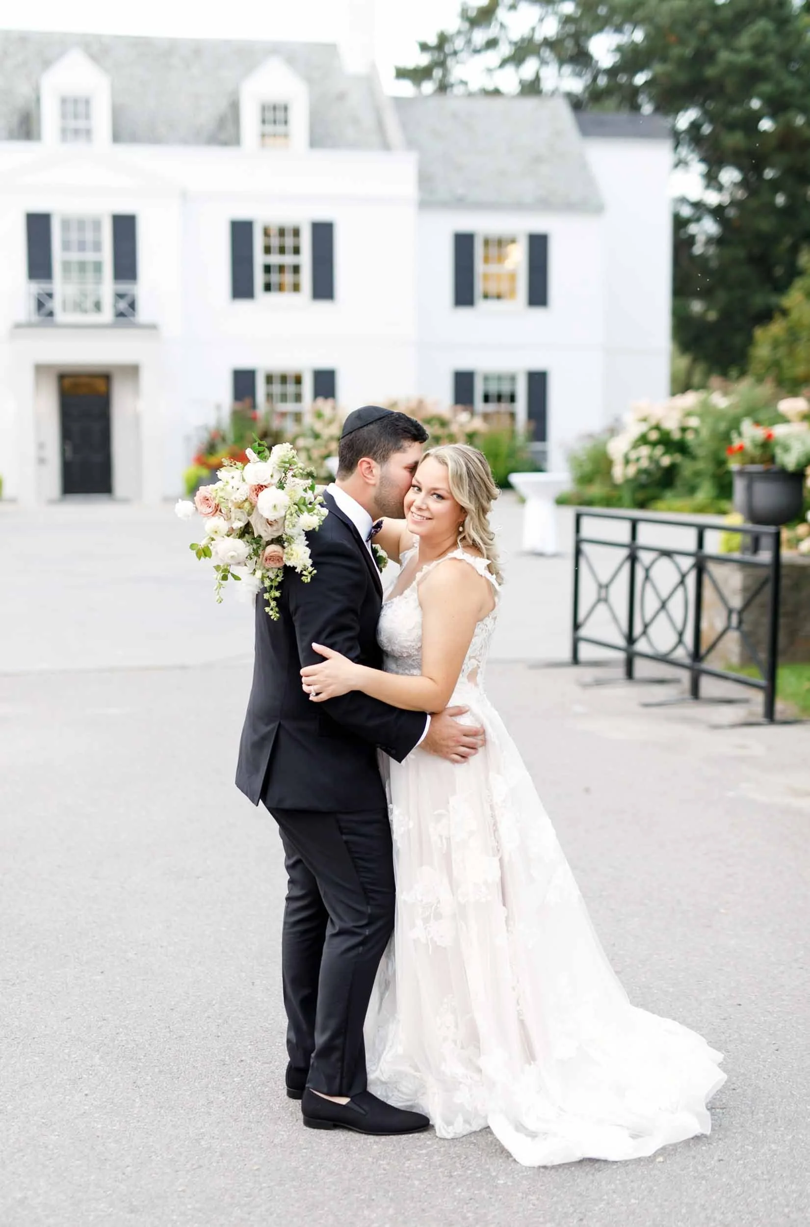 Bride and groom sharing a quiet moment outdoors at the Harding Waterfront Estate (Copy)