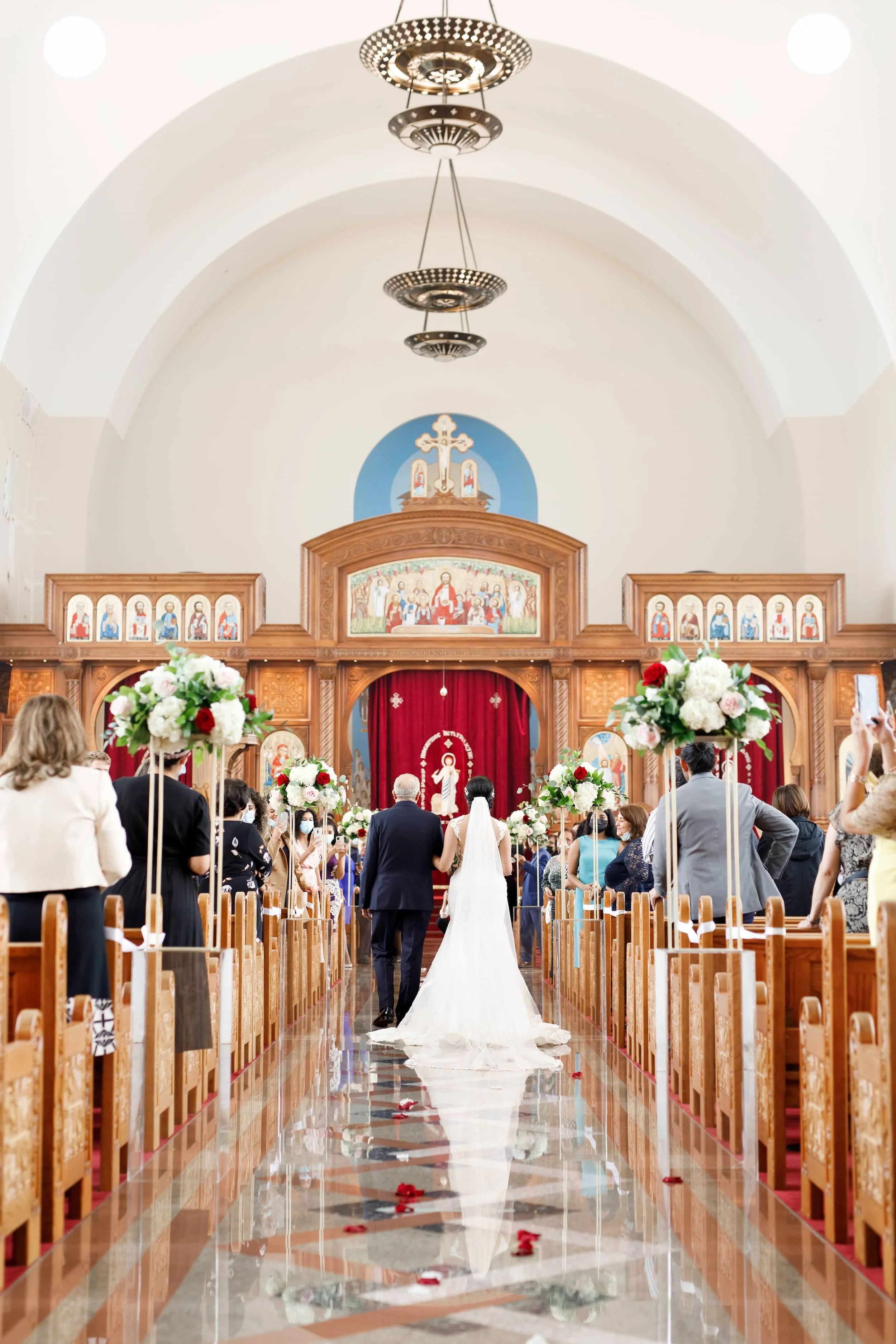 Bride walking down the aisle during a wedding ceremony at St. Mark’s Coptic Cathedral in Markham (Copy)