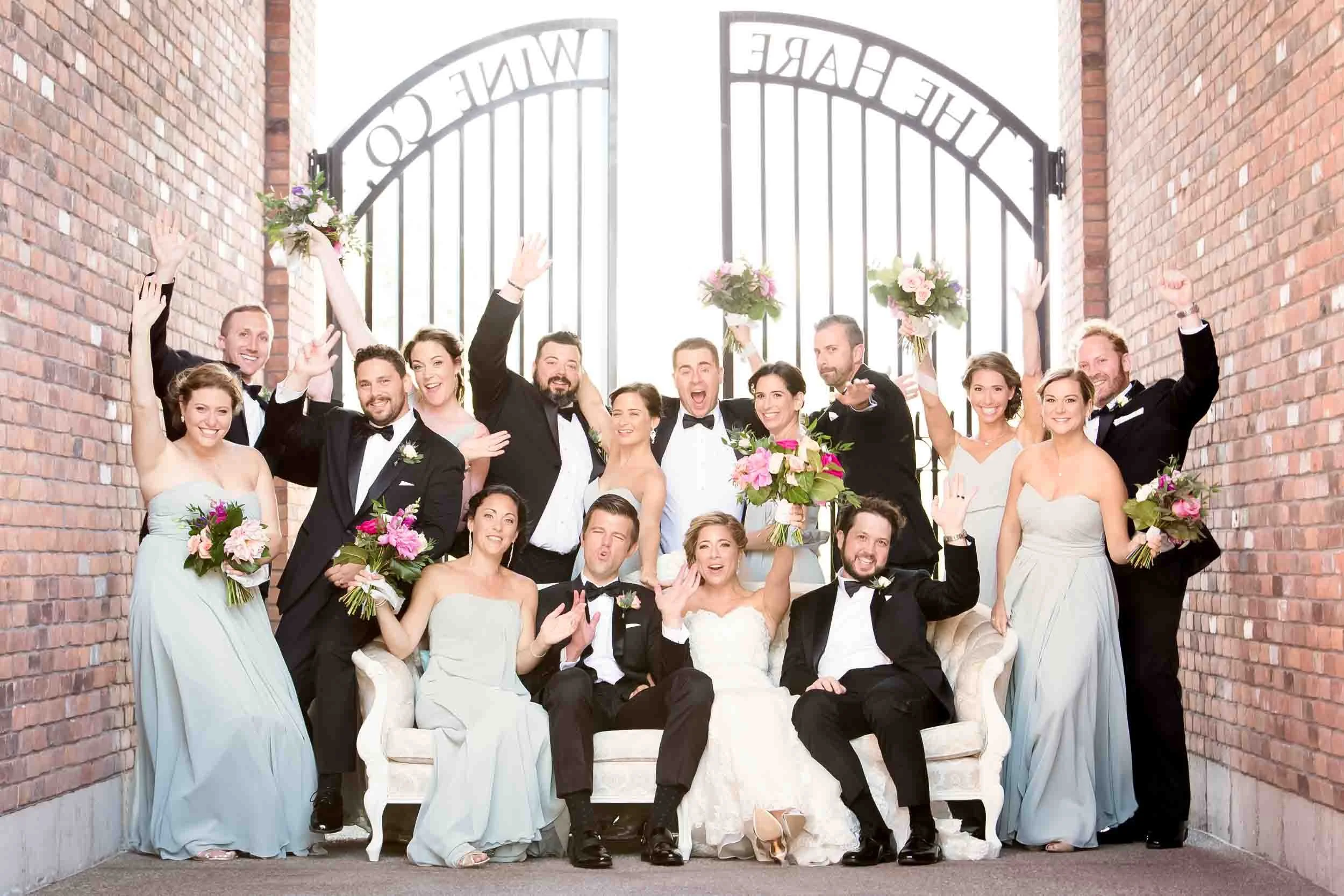 Wedding party celebrating outside The Hare Wine Co in Niagara-on-the-Lake (Copy)