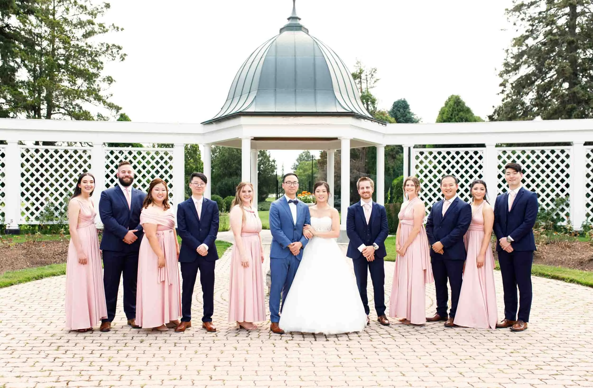 Full wedding party portrait beneath the pavilion gazebo at Royal Botanical Gardens in Niagara Falls (Copy)