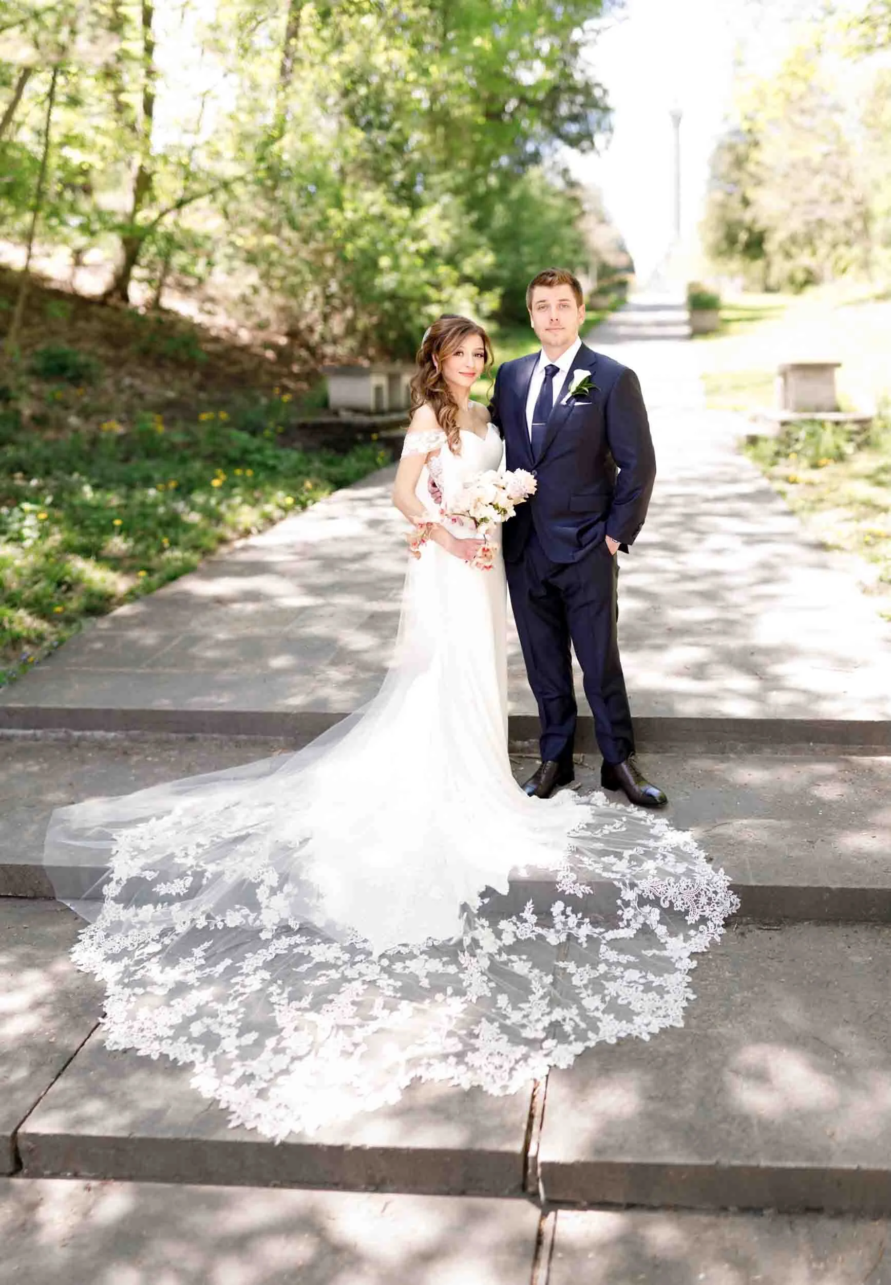 Bride and groom portrait on stone steps at Queenston Heights Park wedding in Niagara-on-the-Lake (Copy)