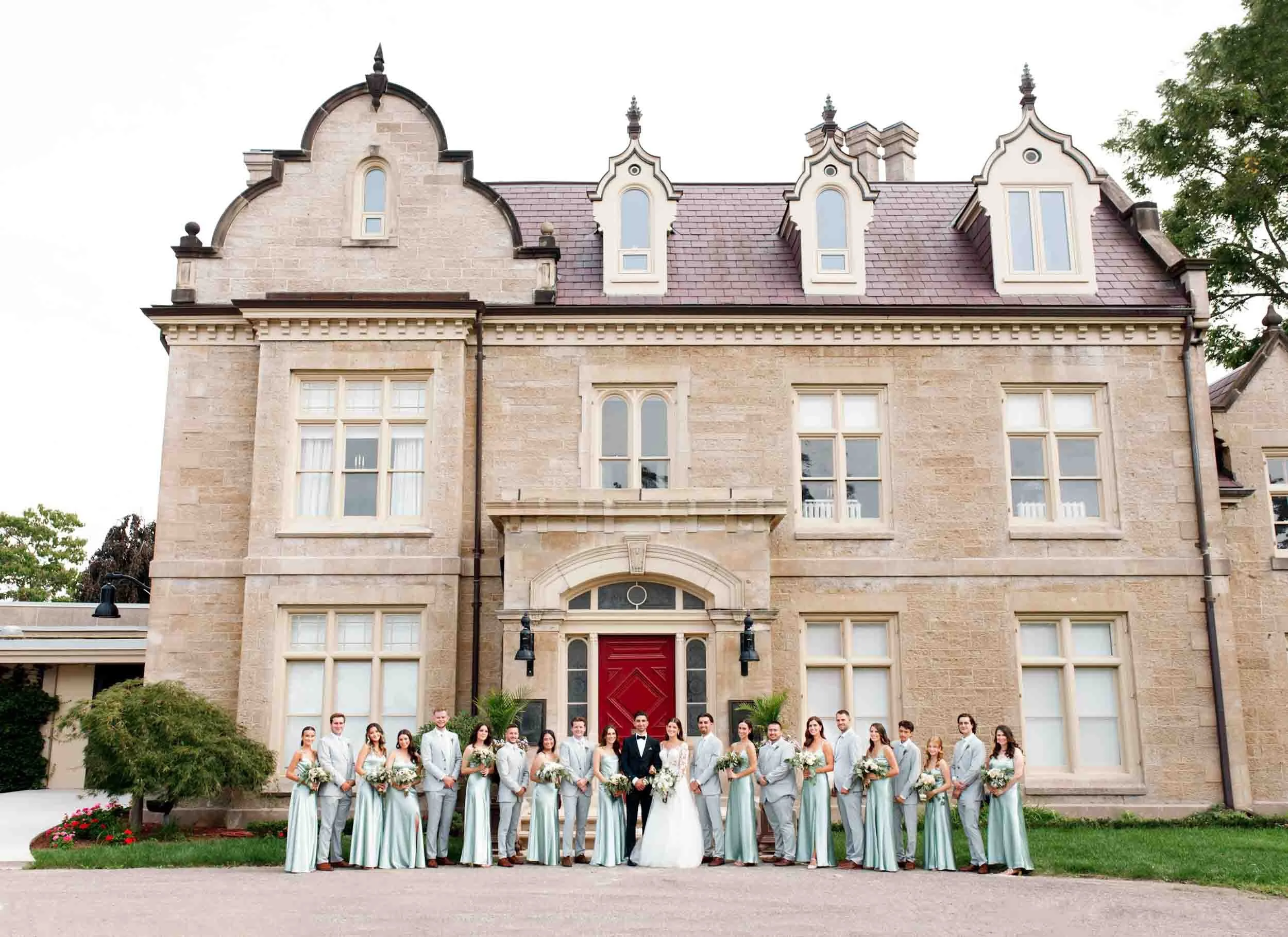 Wedding party lined up outside Rodman Hall Boutique Hotel in St. Catharines (Copy)