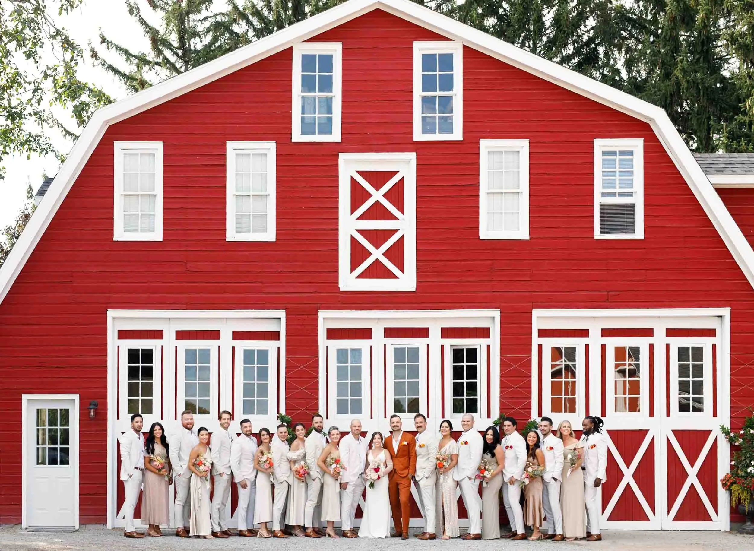 Wedding party lined up in front of red barn at Cherry Avenue Farms in Vineland Station (Copy)