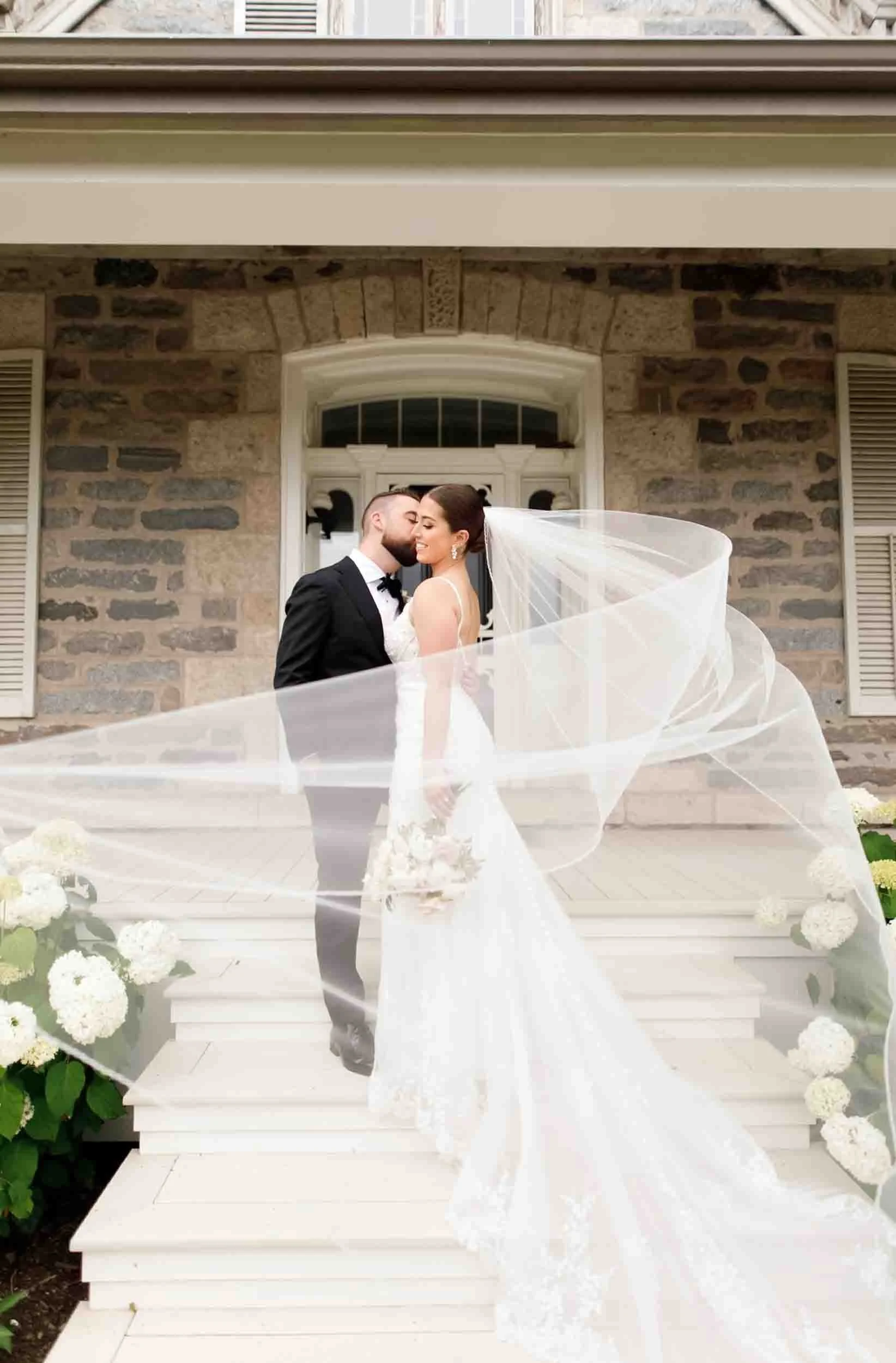 Bride and groom portrait with flowing veil in the Niagara Region (Copy)