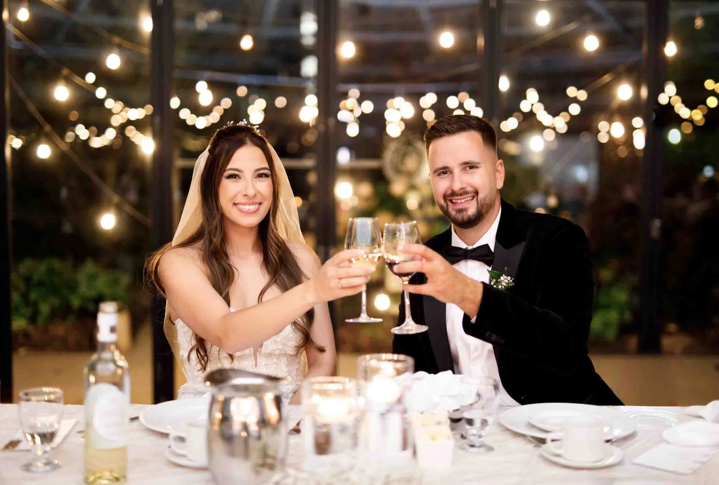 Bride and groom toasting at reception at Club Roma in St. Catharines (Copy)
