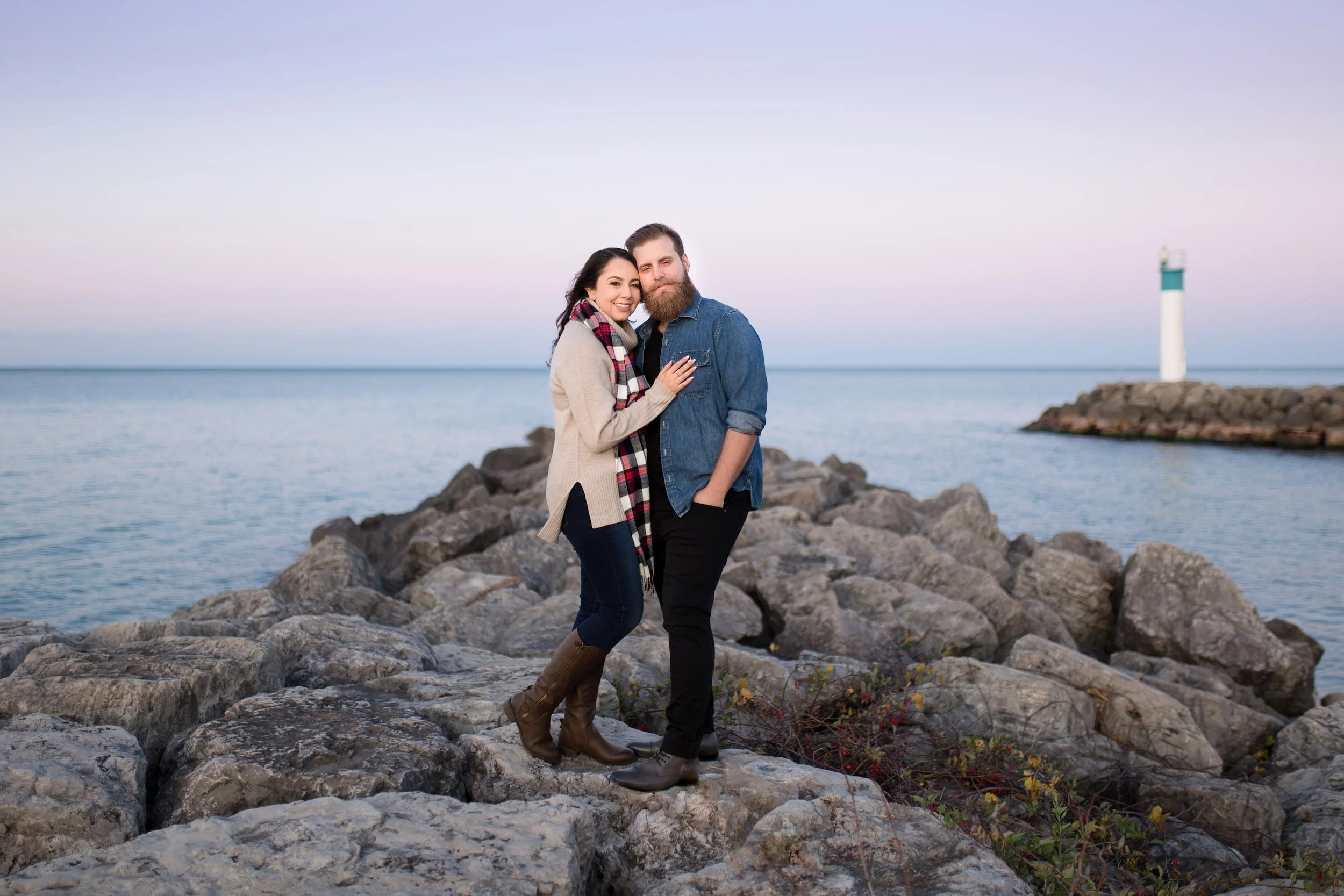 Engagement portrait on rocky shoreline at Fifty Point Conservation Area in Hamilton (Copy)