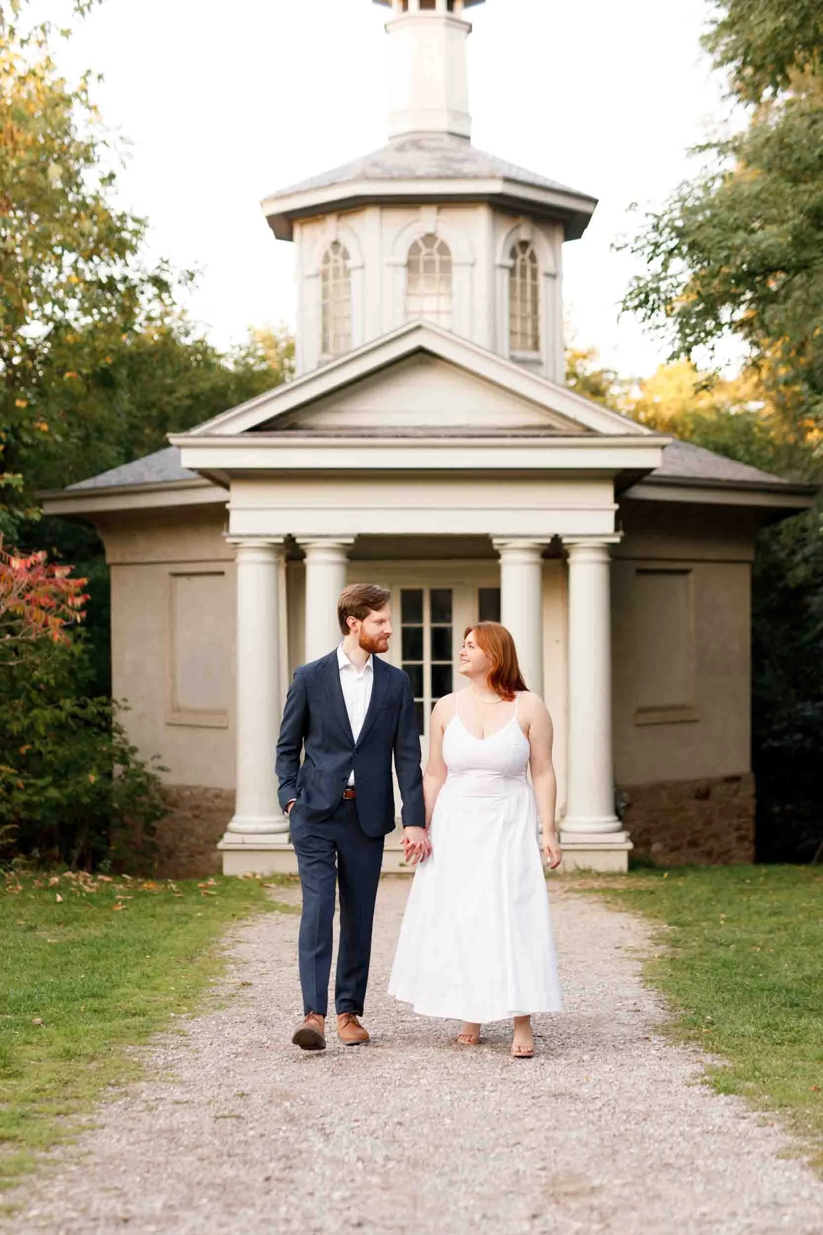 Couple walking in front of Dundurn Castle during Hamilton engagement session (Copy)