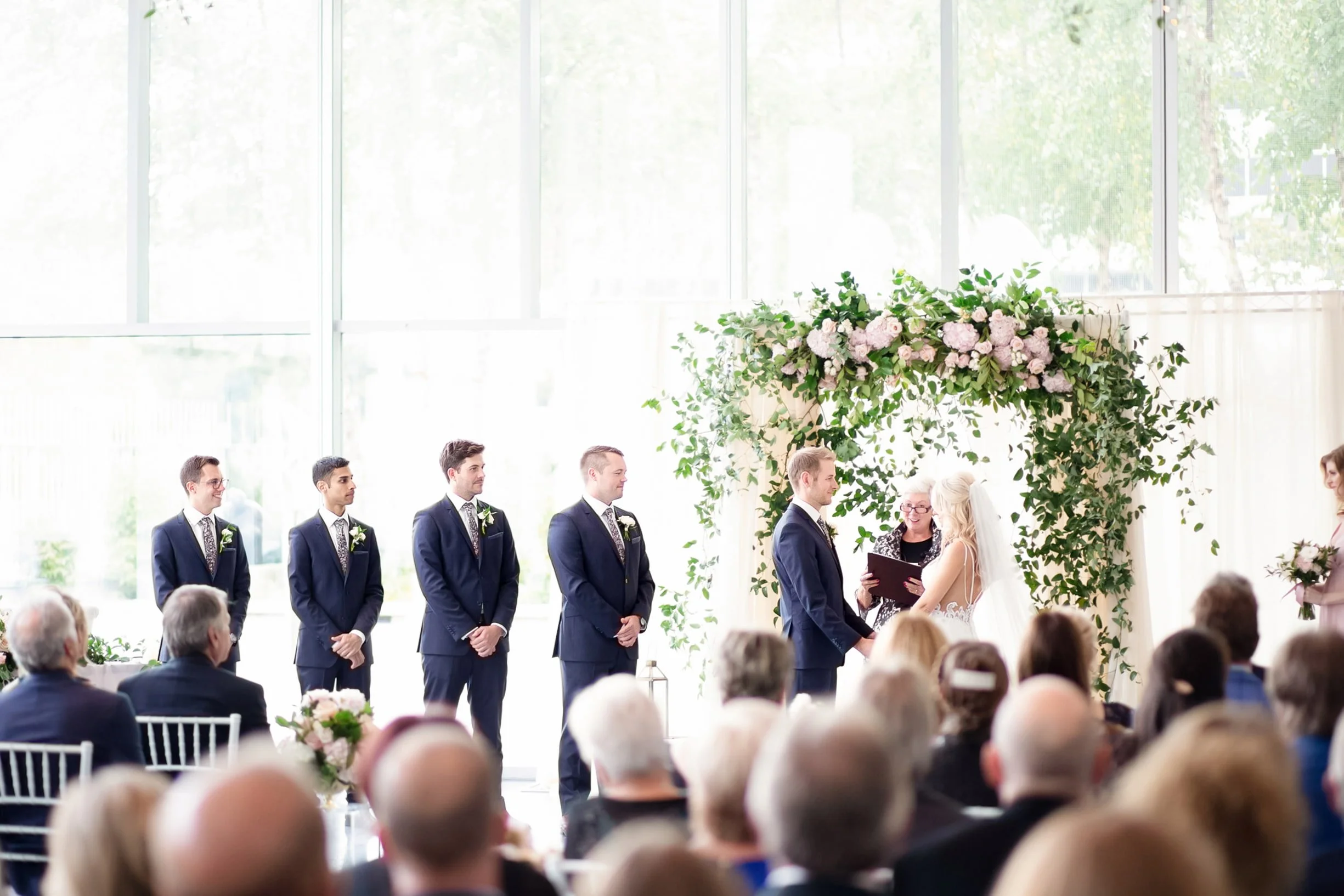 Wedding ceremony at Art Gallery of Hamilton with floral arch (Copy)