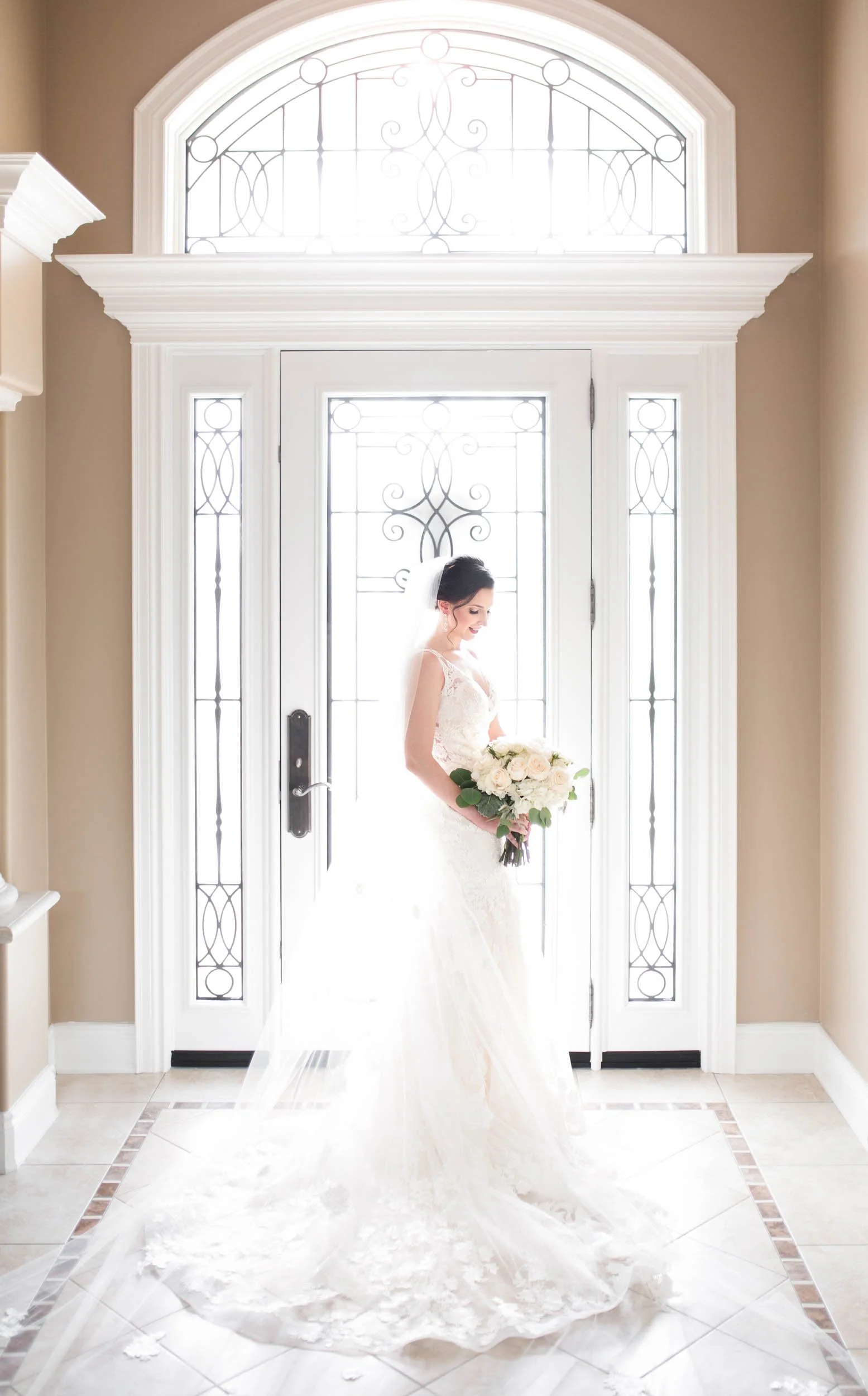Bride posing in her Hamilton home doorway before wedding ceremony (Copy)