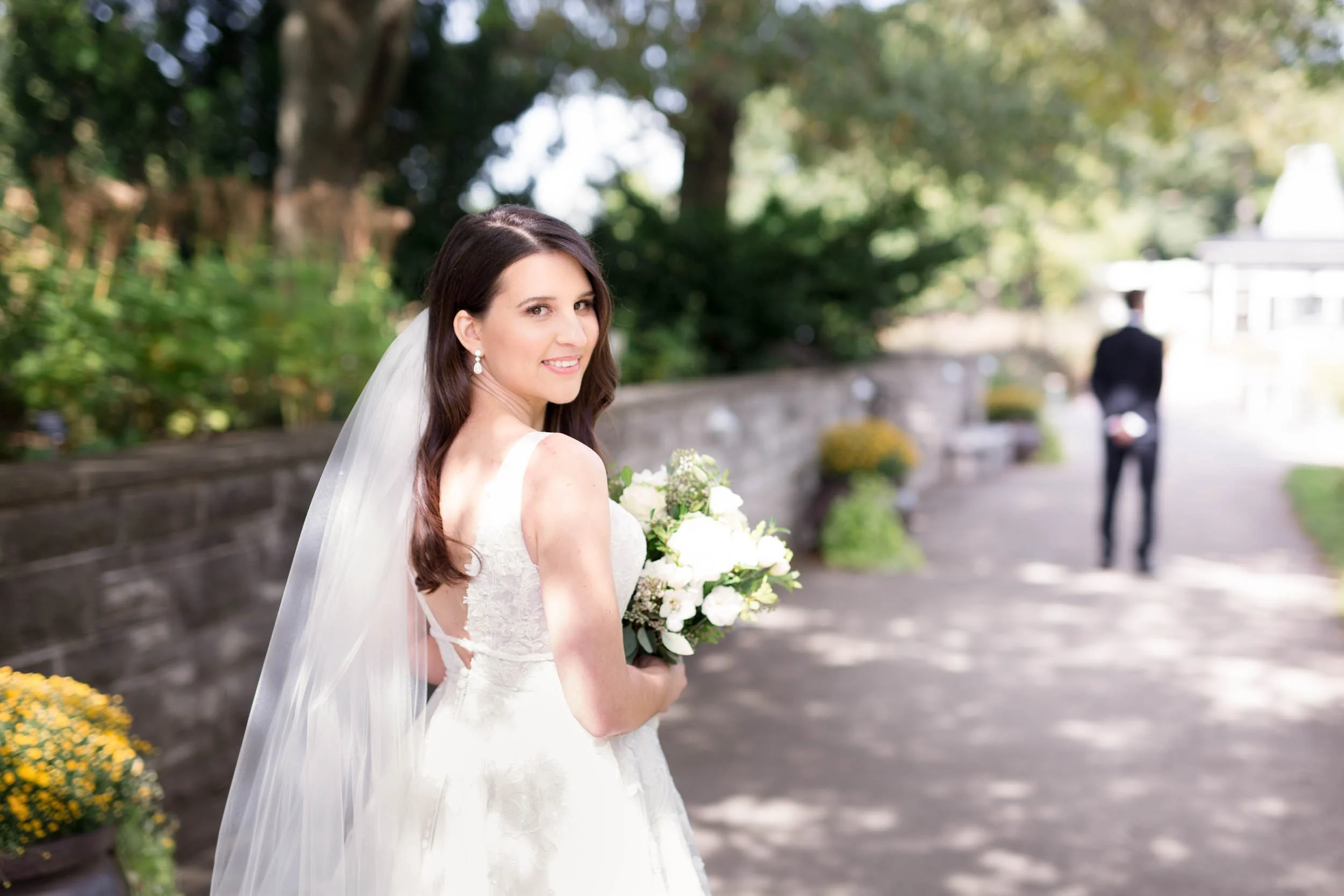 Bride approaching goorm during first look at Royal Botanical Gardens in Hamilton, Ontario (Copy)