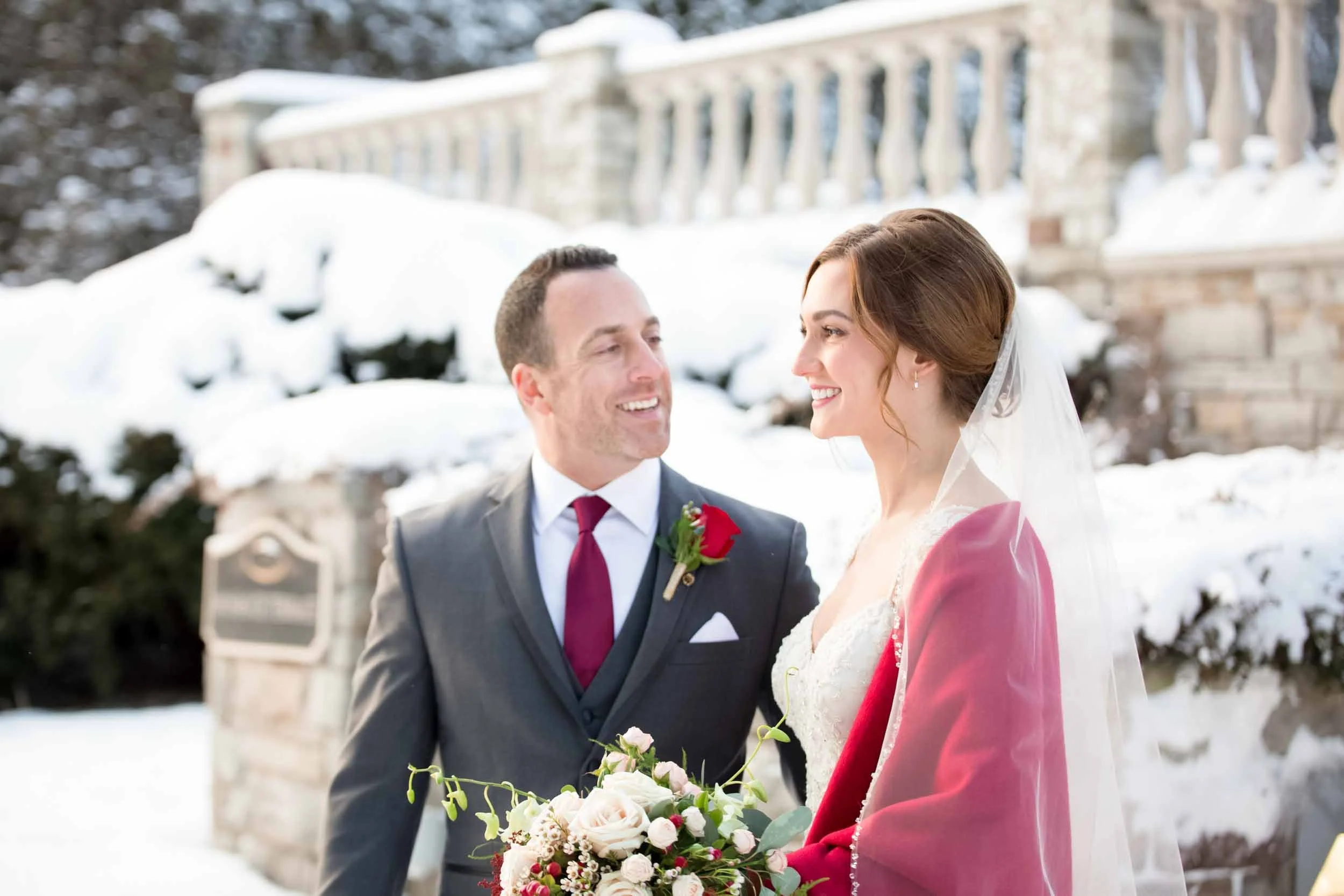 Bride and groom portrait in snow at Paletta Mansion winter wedding in Burlington (Copy)