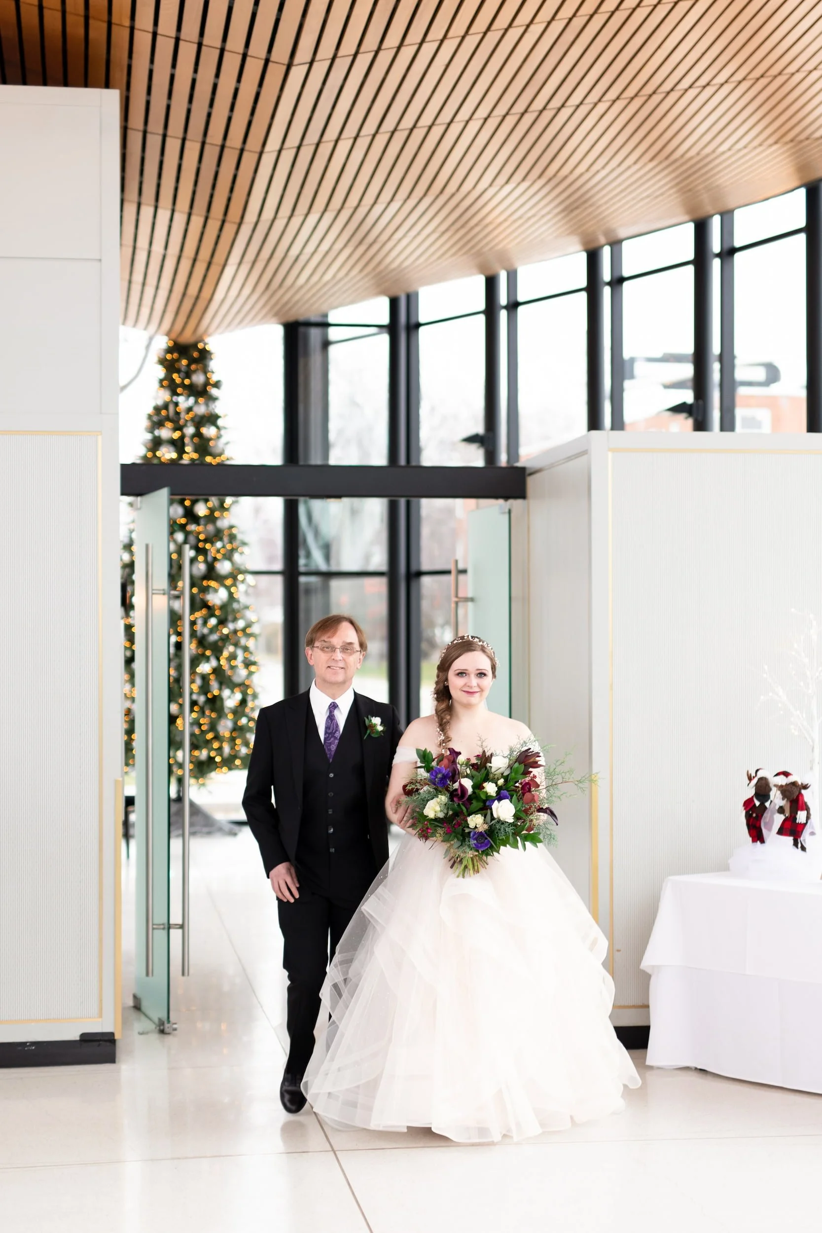 Father of the bride escorting bride down the aisle at Spencer’s at the Waterfront reception in Burlington (Copy)