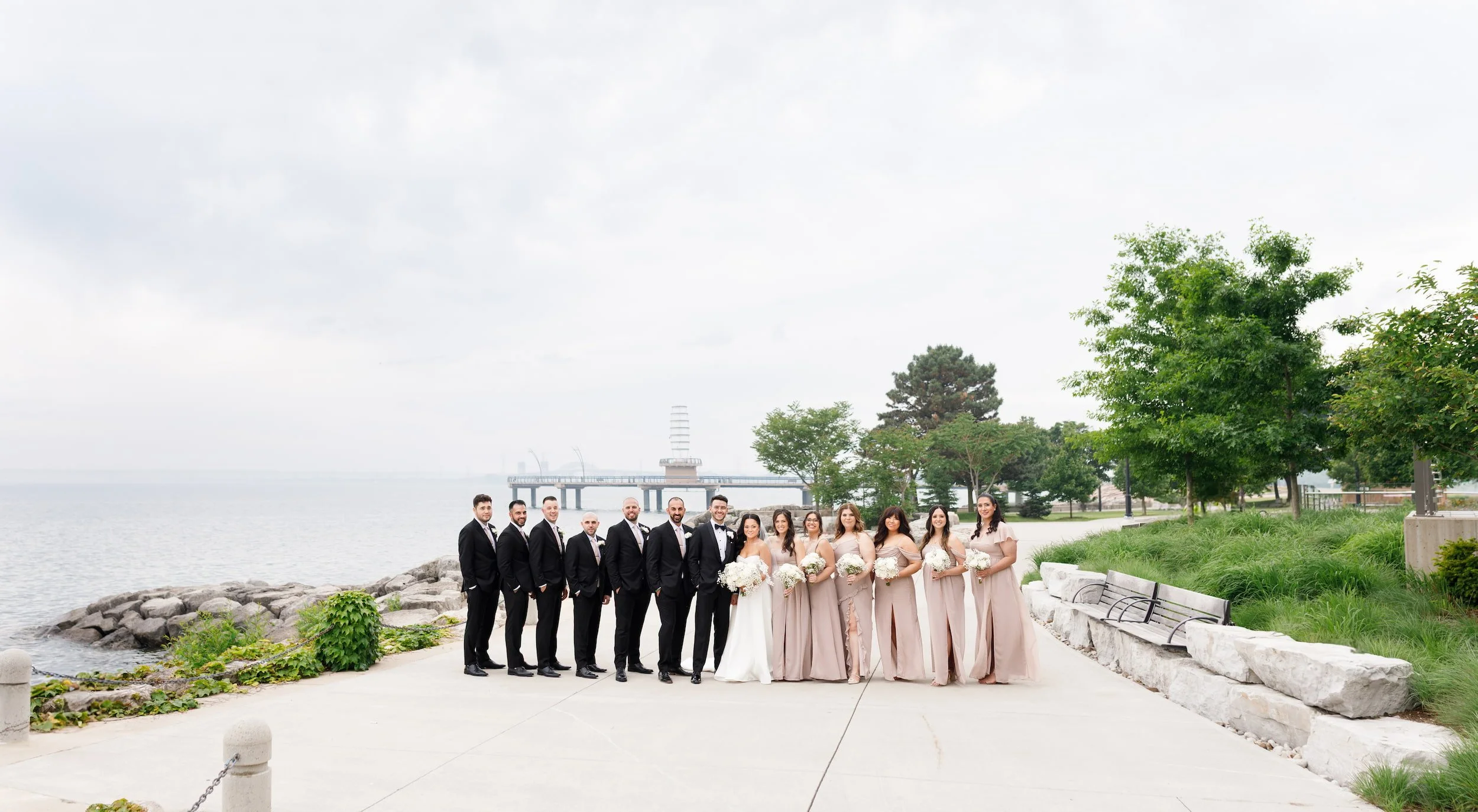 Wedding party lined up along the waterfront at Spencer Smith Park in Burlington (Copy)