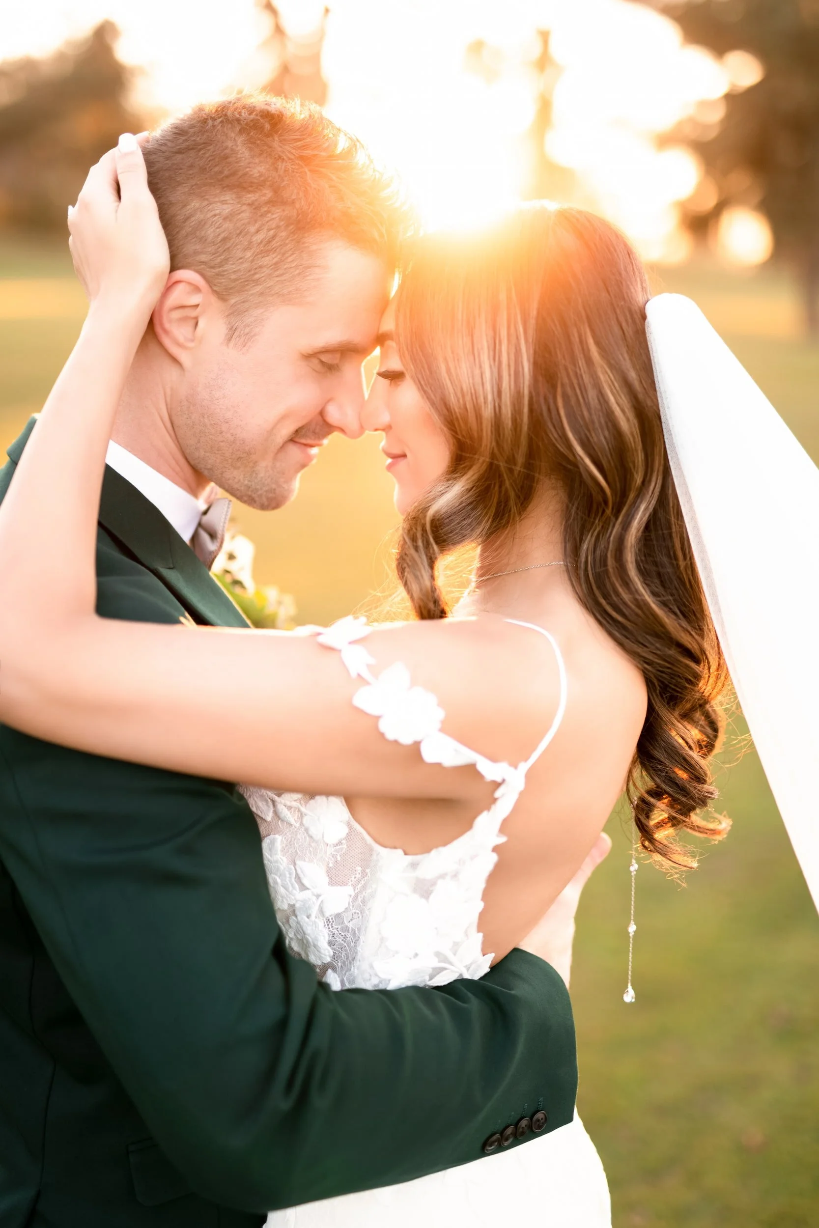 Close-up sunset wedding portrait of bride and groom surrounded by golden light at Rockway Gardens in the Waterloo Region (Copy)