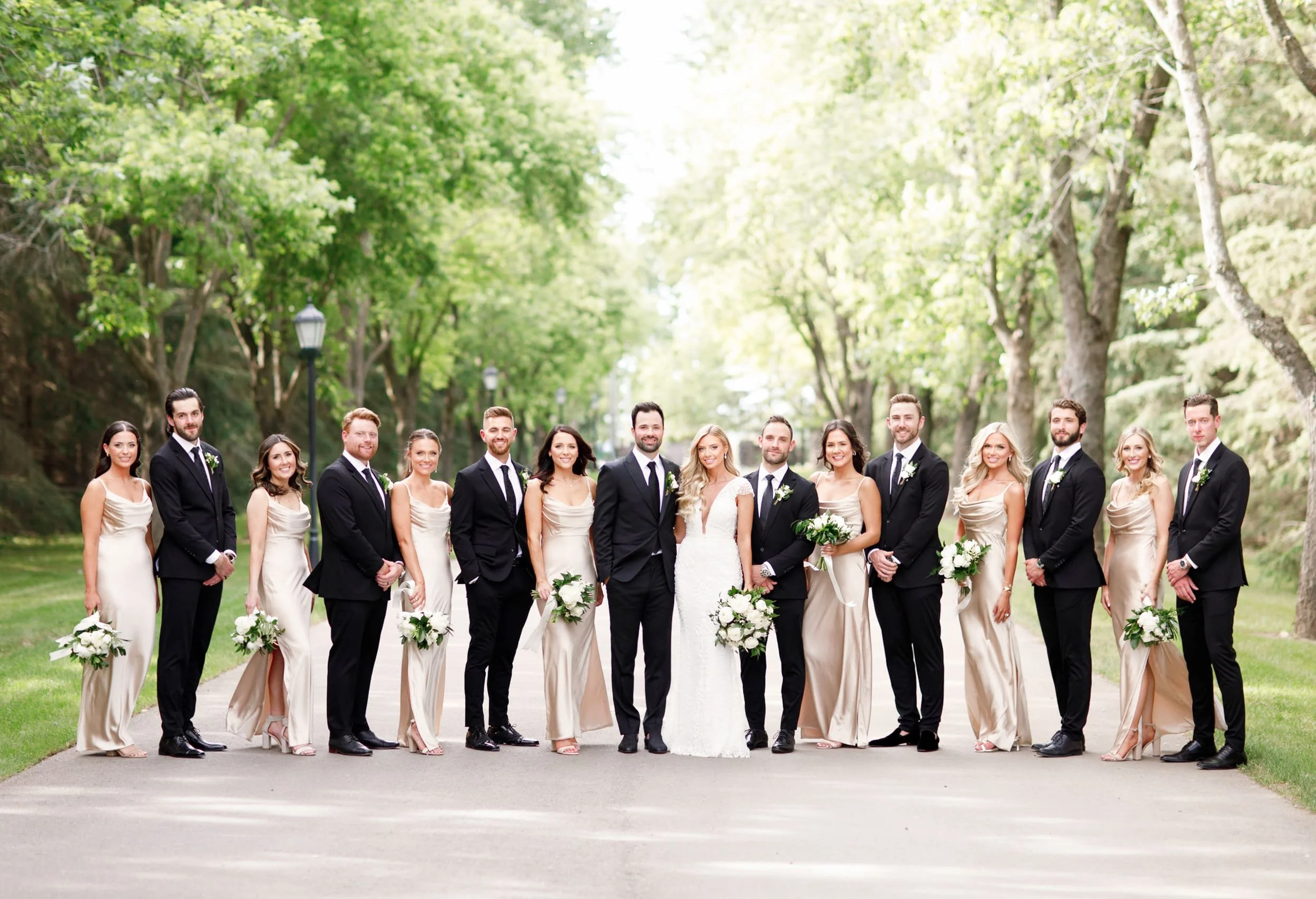 Full wedding party posed outdoors at Roseville Estate in the Waterloo Region, Ontario (Copy)