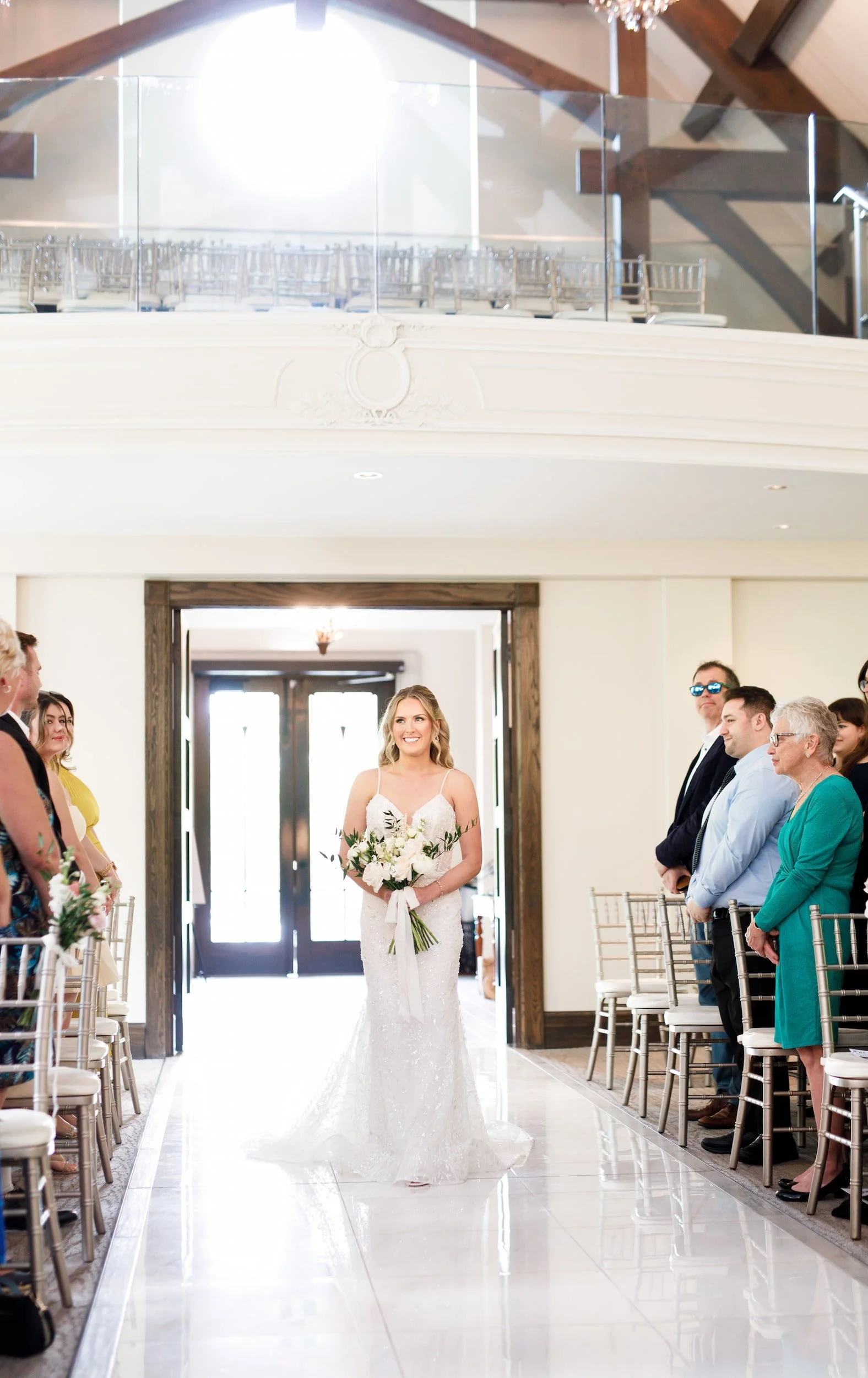 Bride entering Miller’s Chapel at the Ancaster Mill in Ancaster, Ontario