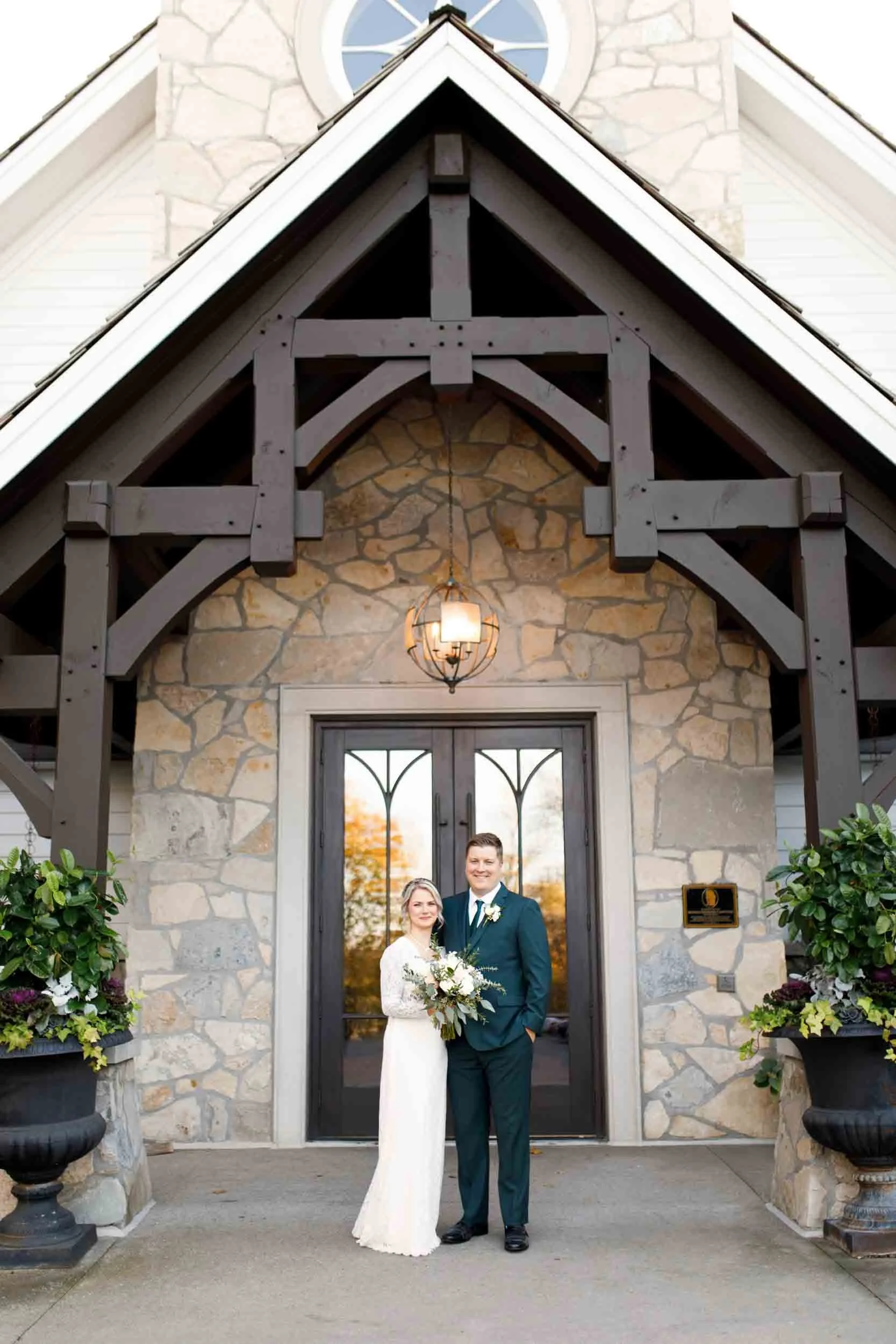 Bride and groom portrait at the Ancaster Mill stone doorway