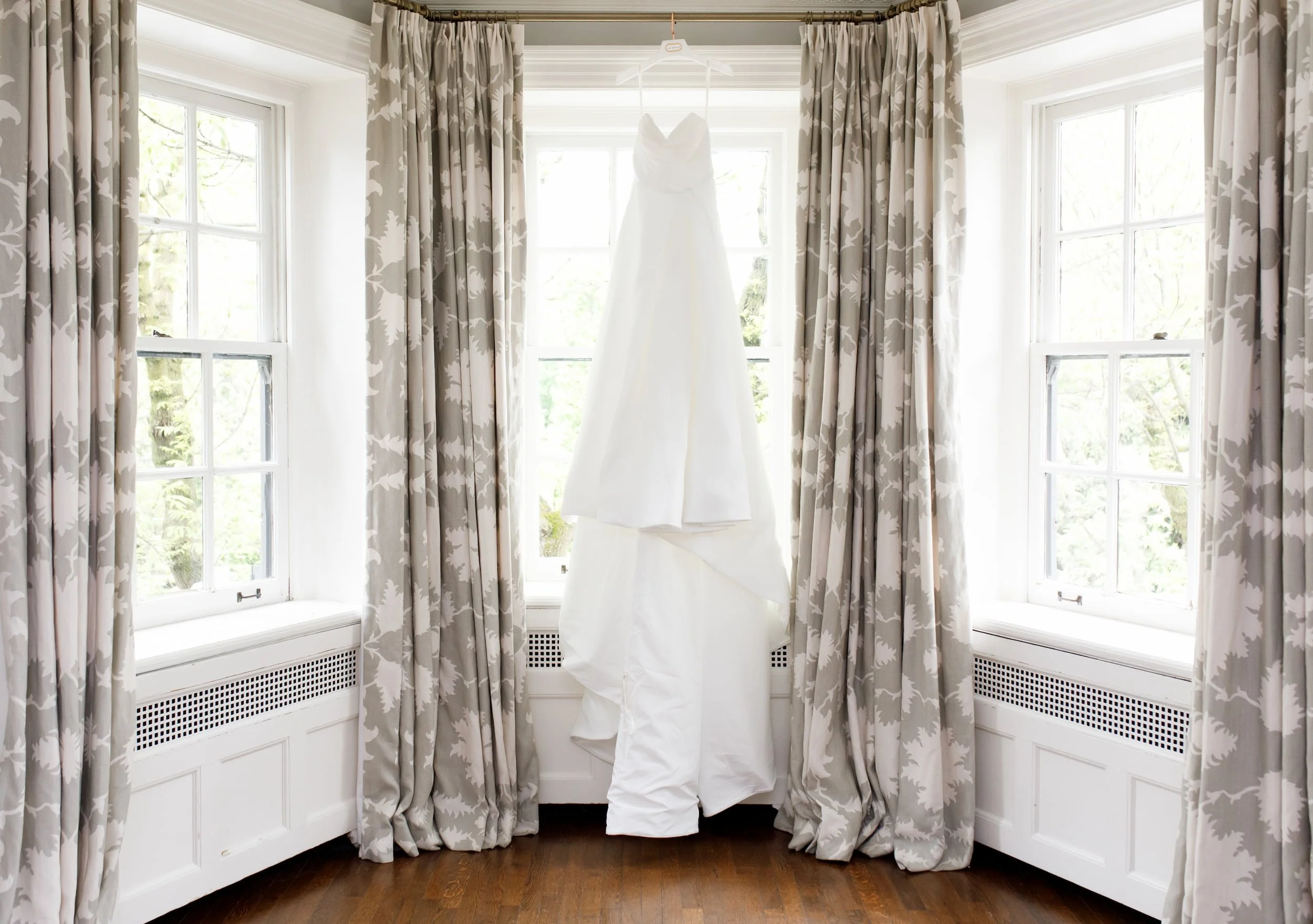 Wedding dress hanging in bridal suite at Graydon Hall Manor