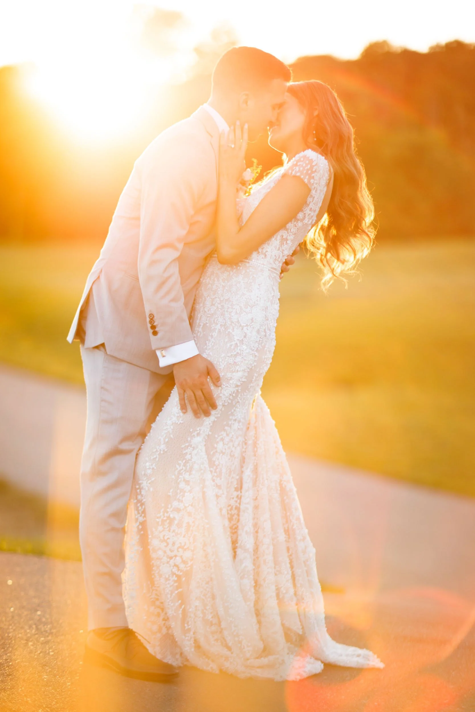 Sunset portrait of newlyweds on the grounds of Whistle Bear Golf Club in Cambridge, Ontario