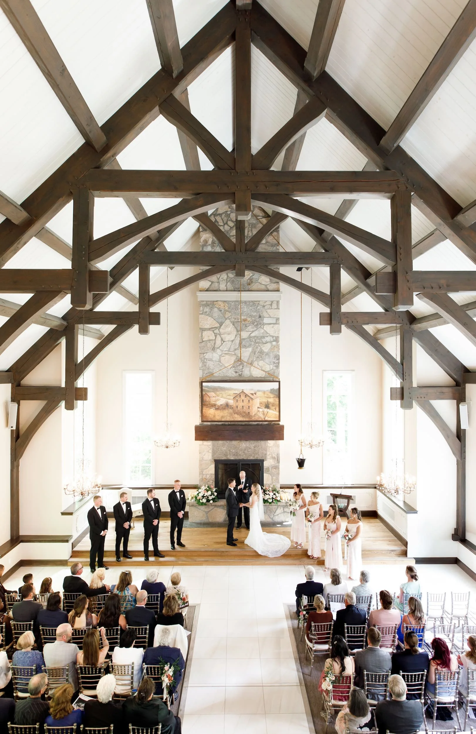Wide ceremony view inside Miller’s Chapel at the Ancaster Mill