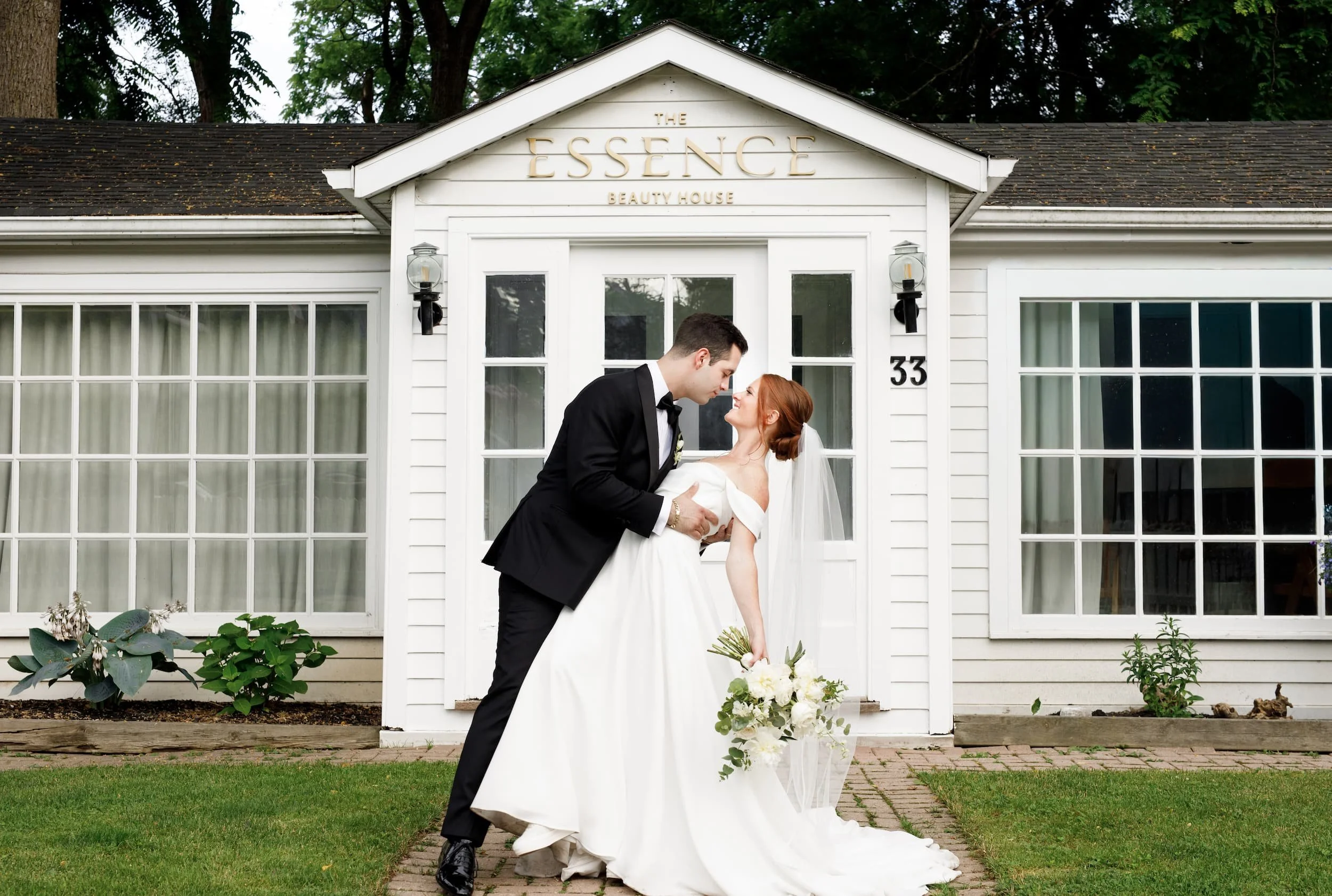 Bride and groom portrait outside The Essence building at The Doctor’s House in Kleinburg, Ontario