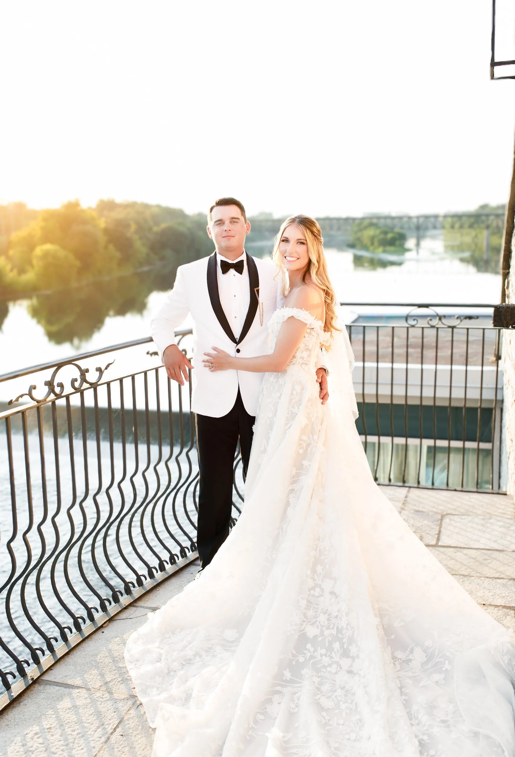 Bride and groom portrait on terrace balcony at Cambridge Mill in Cambridge, Ontario