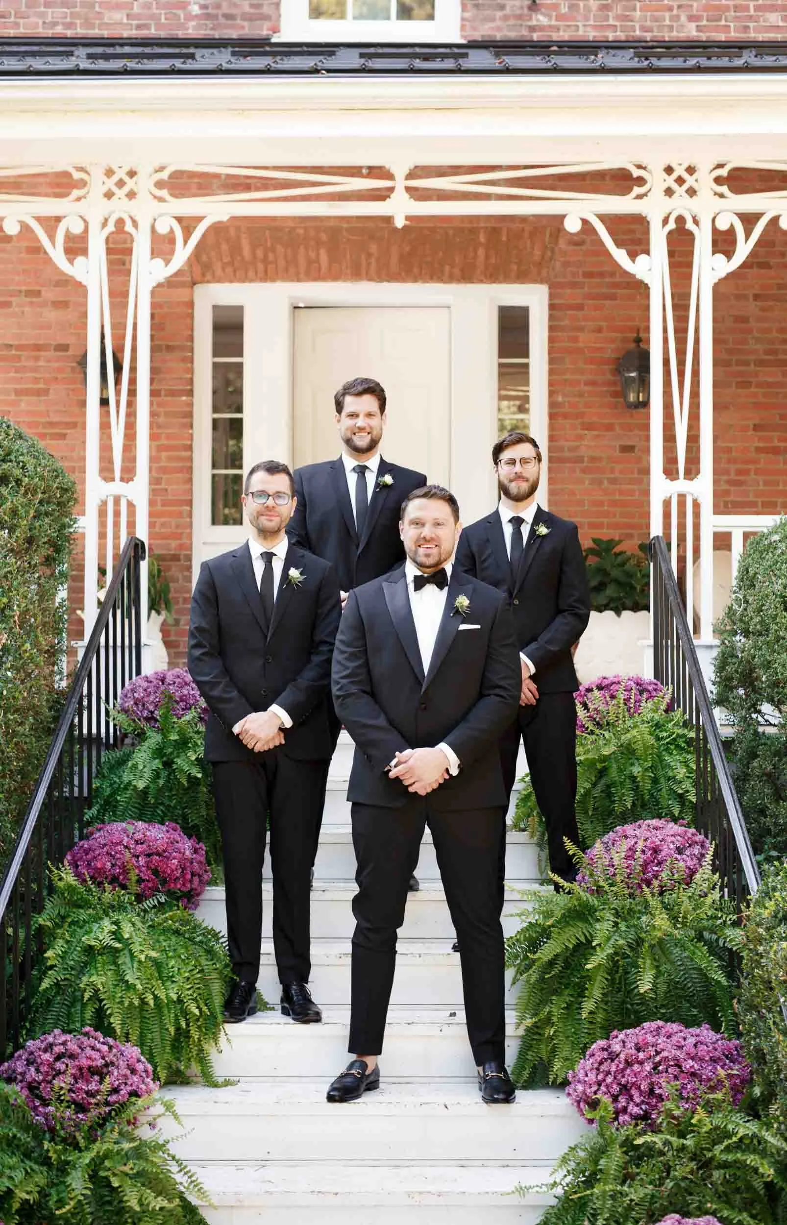 Groomsmen portrait at Gracewood Estate farmhouse in Niagara-on-the-Lake