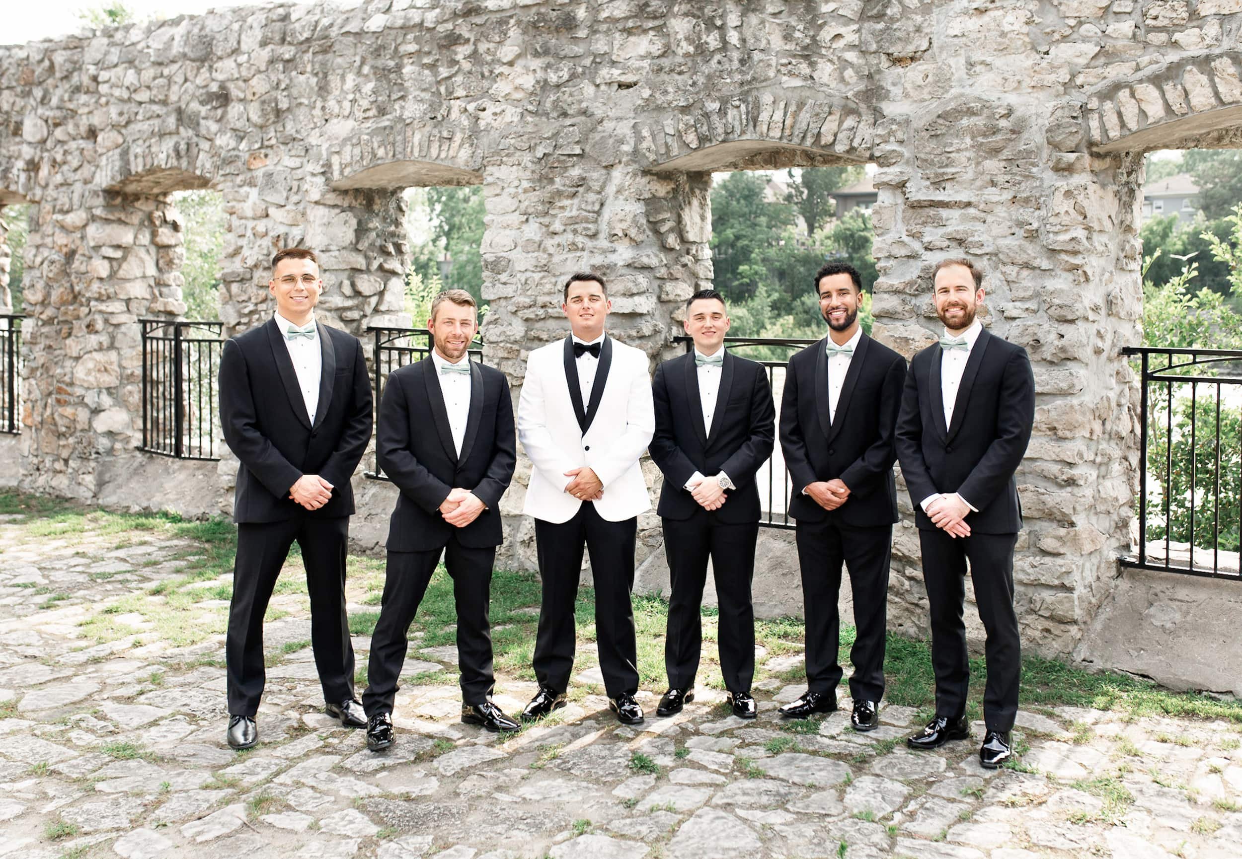 Groomsmen portrait at Mill Race Park near Cambridge Mill in Cambridge, Ontario
