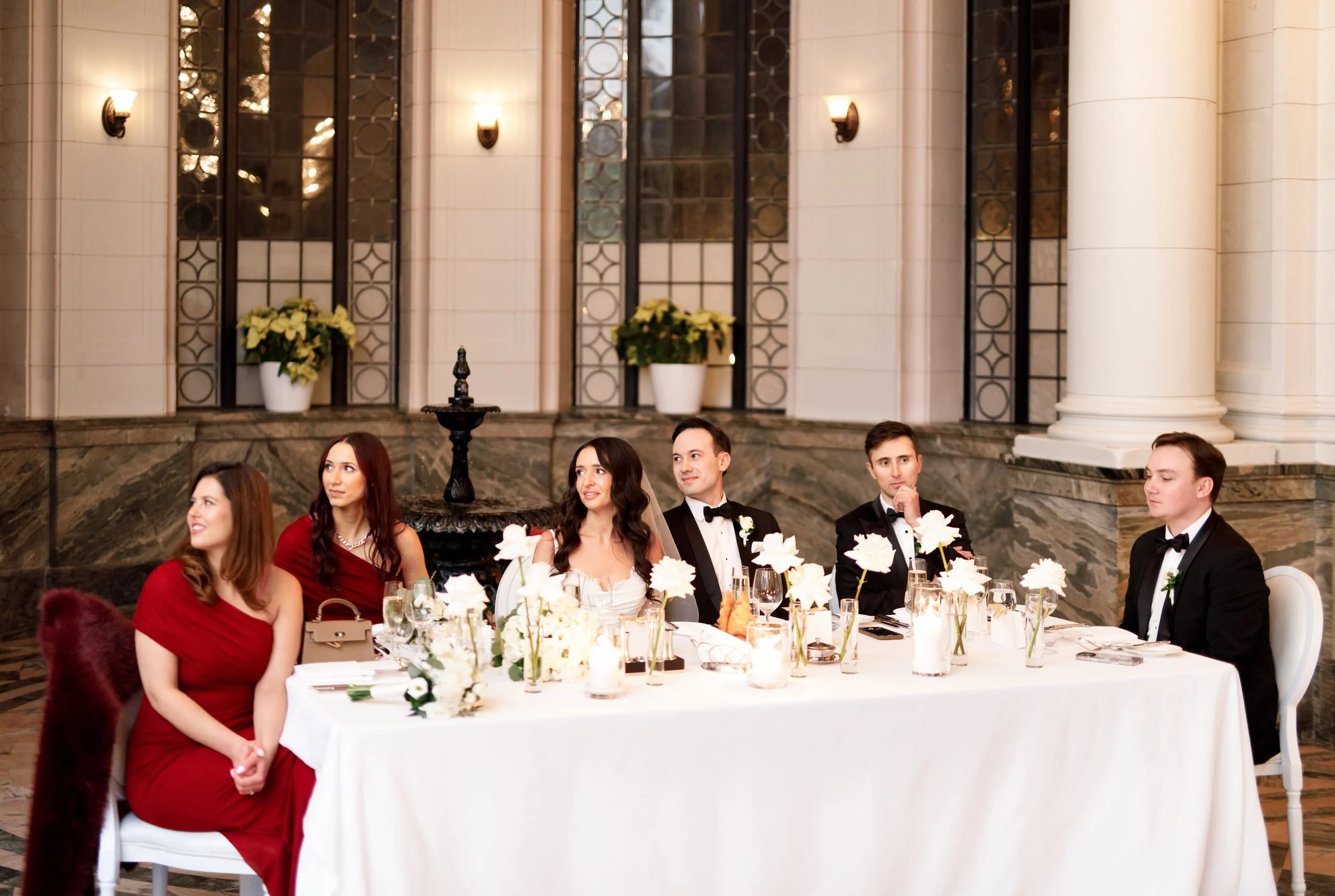 Wedding dinner speeches inside Casa Loma Conservatory