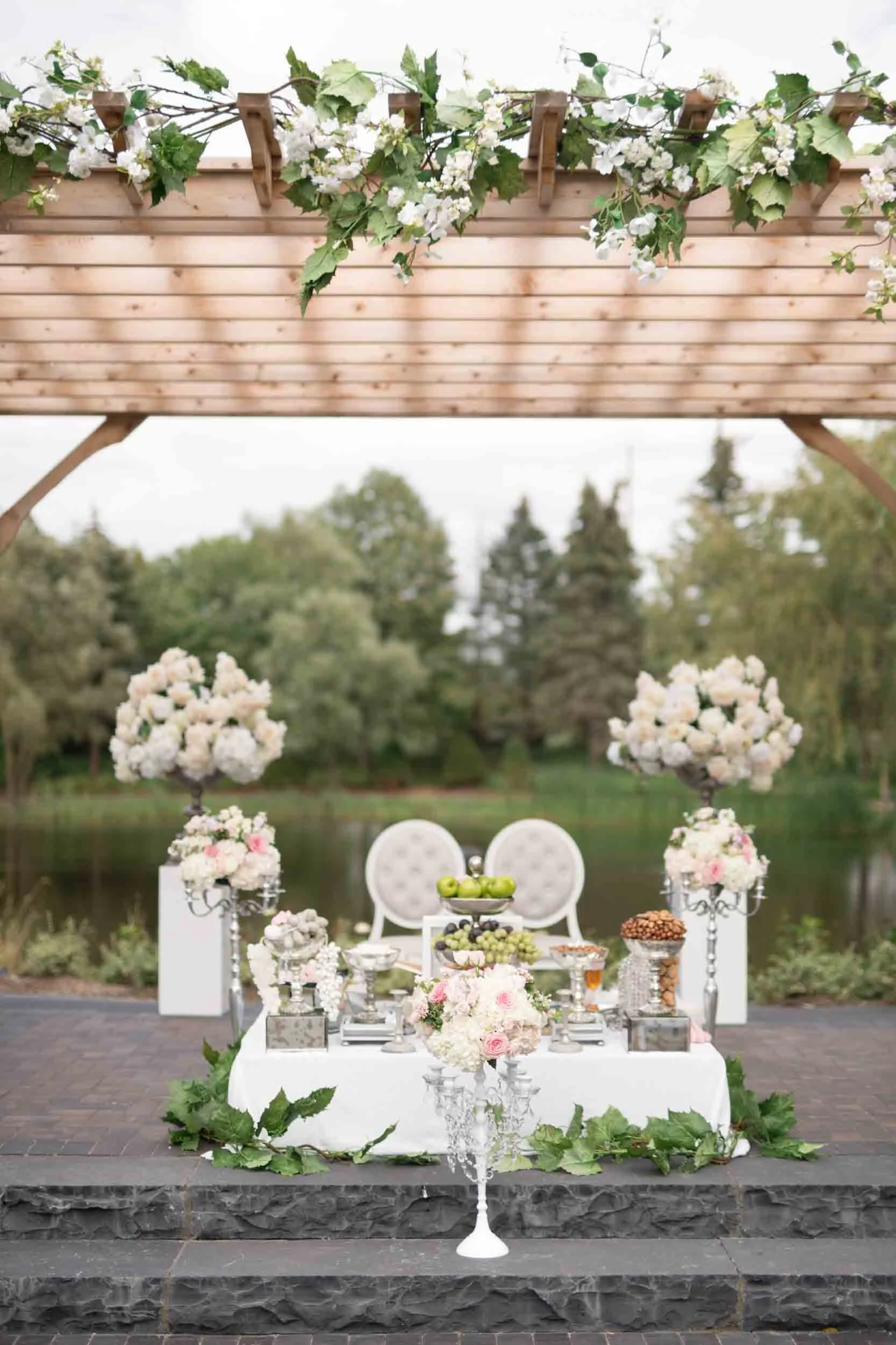 Outdoor ceremony décor by the lake at the Arlington Estate in Vaughan