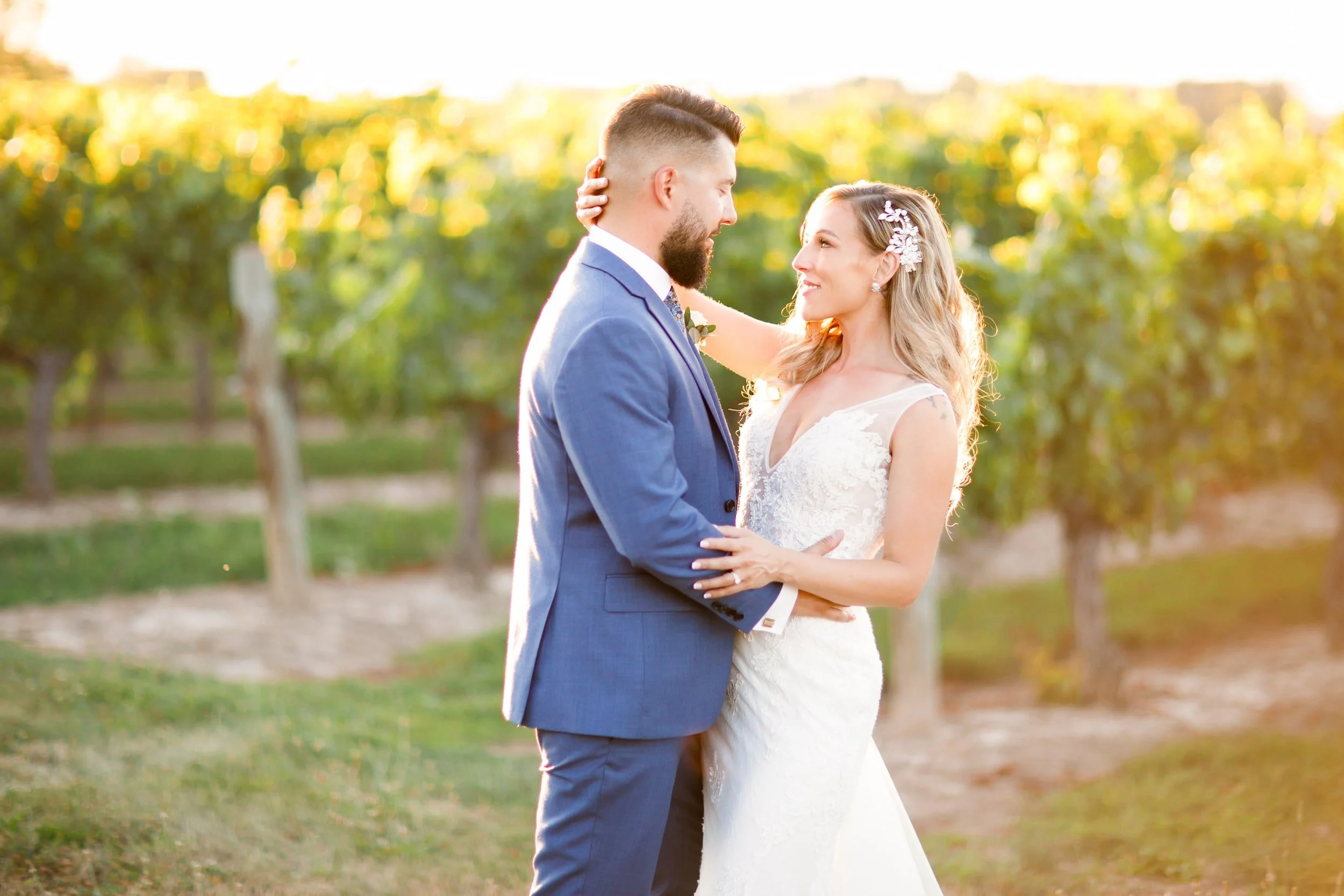 Romantic portrait among grapevines at Kurtz Orchards
