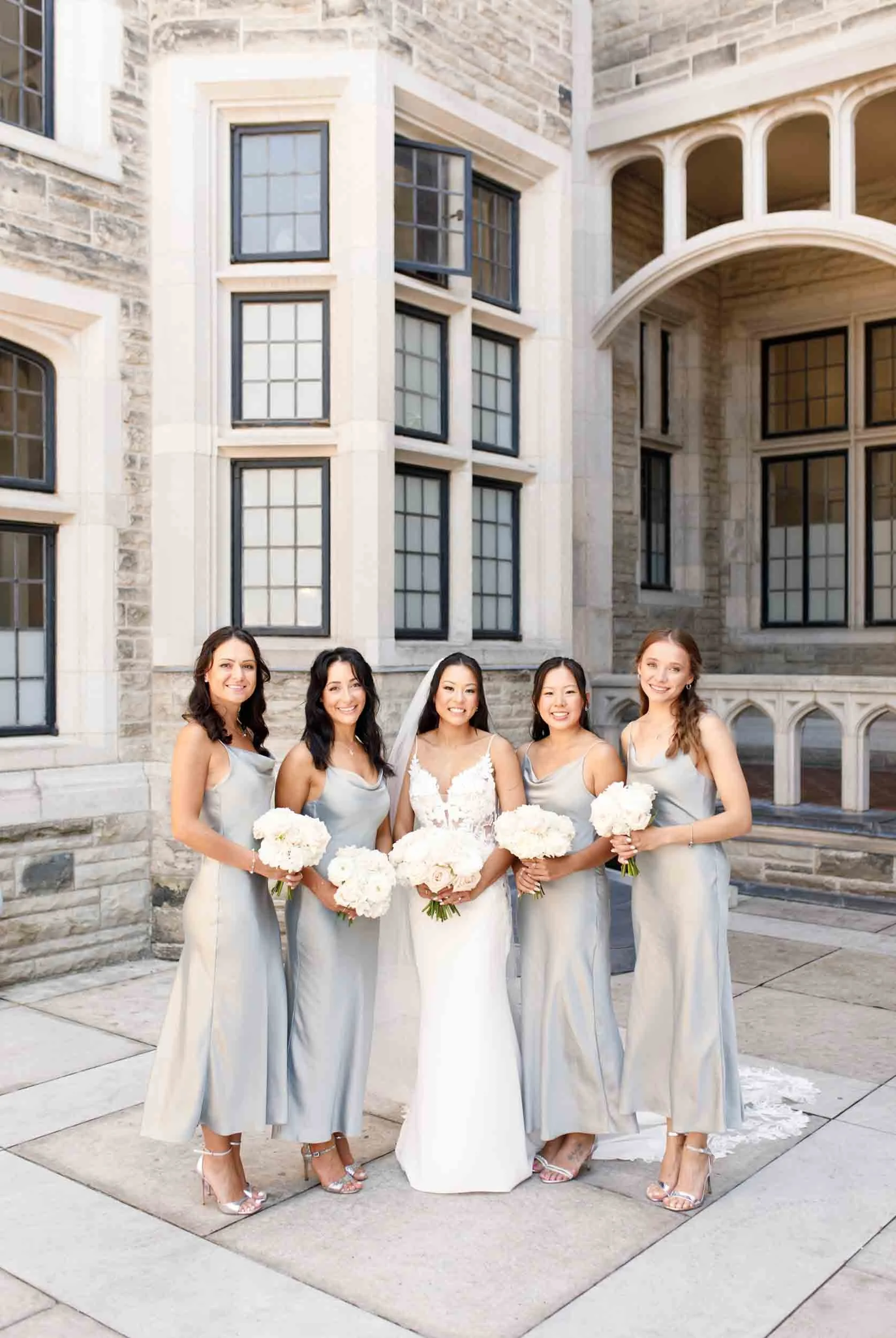 Bridesmaids portrait in the Casa Loma courtyard