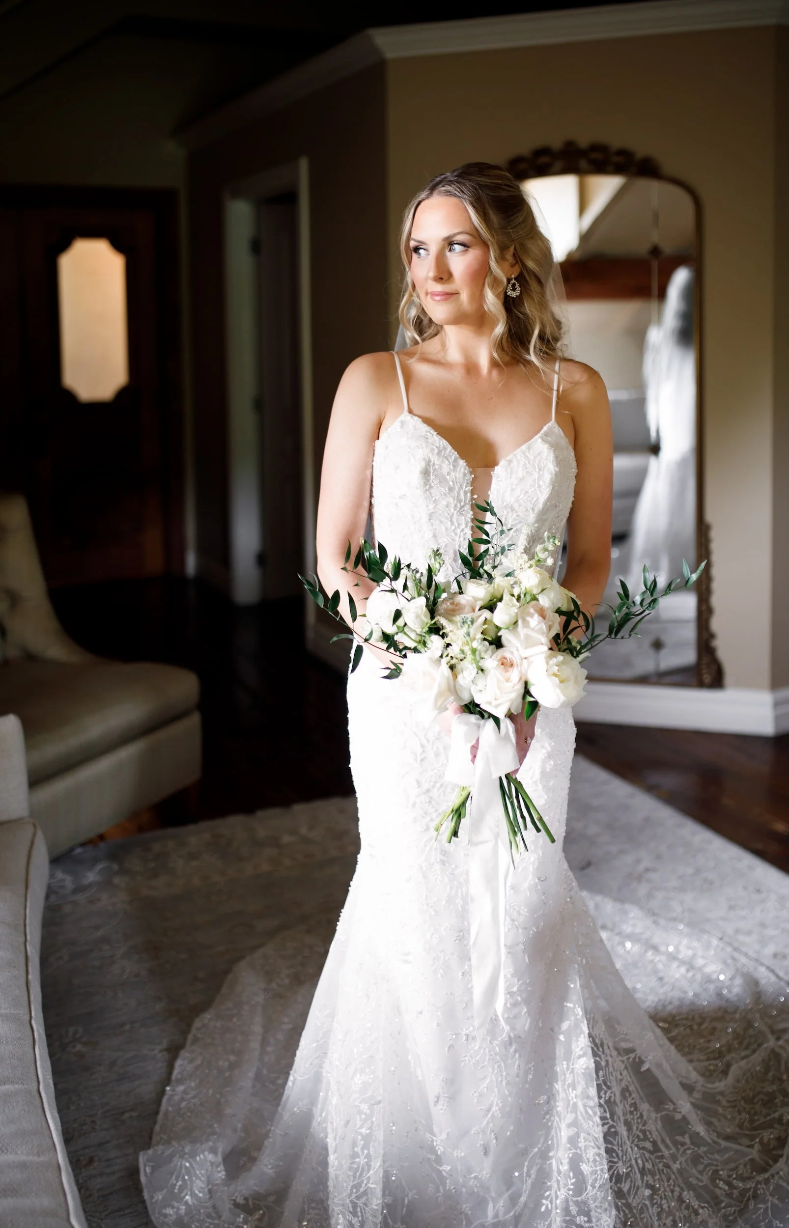 Bridal portrait getting ready in bridal suite at the Ancaster Mill