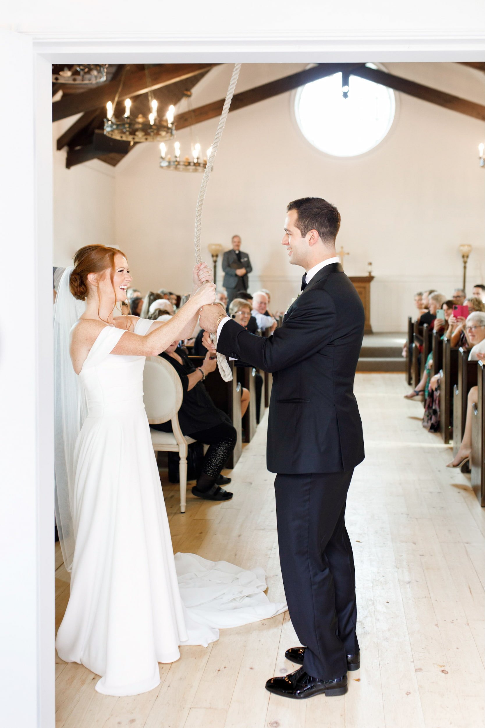 Unity ceremony during chapel wedding at The Doctor’s House in Kleinburg, Ontario