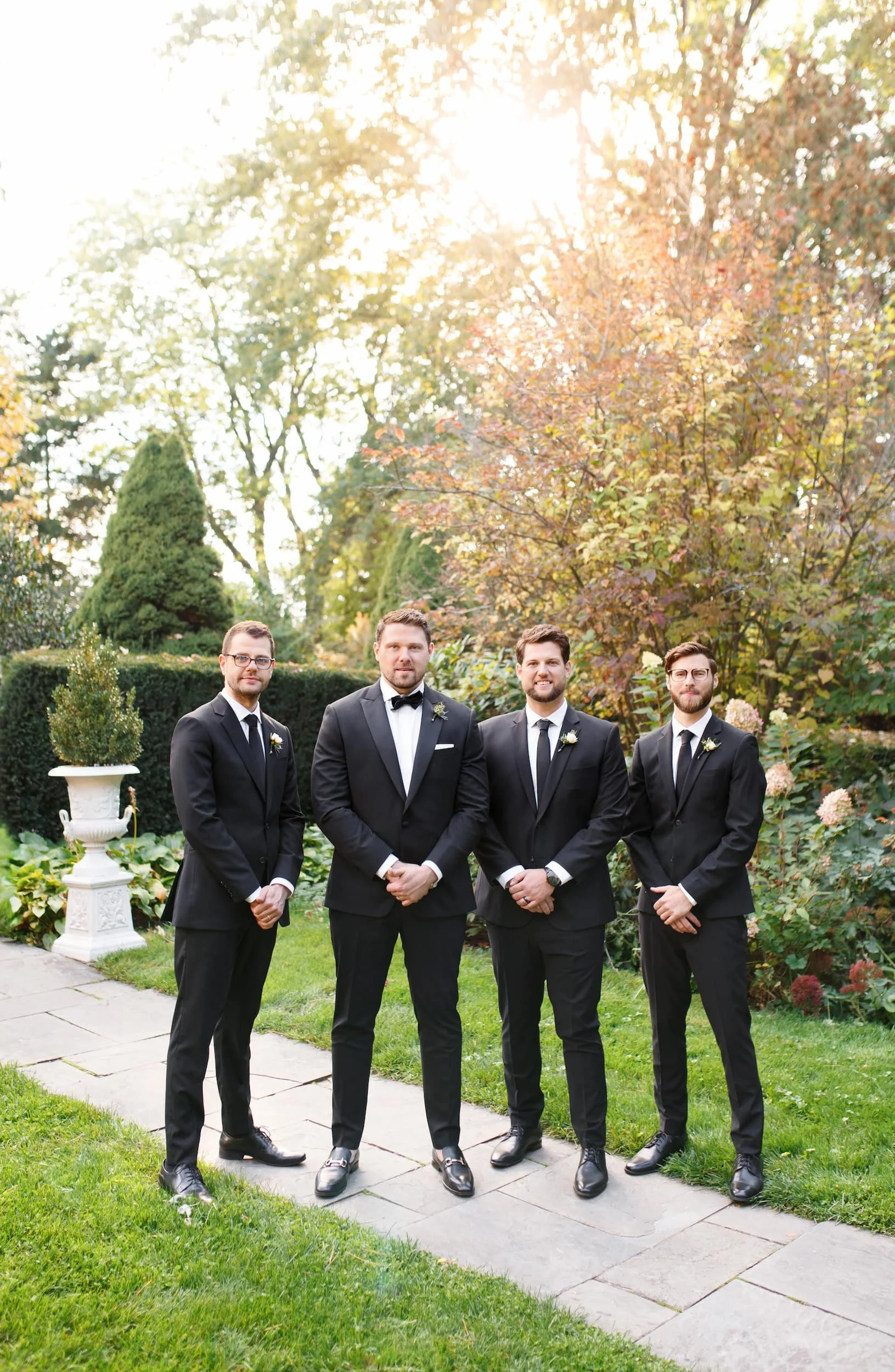 Groomsmen portrait in autumn garden at Gracewood Estate