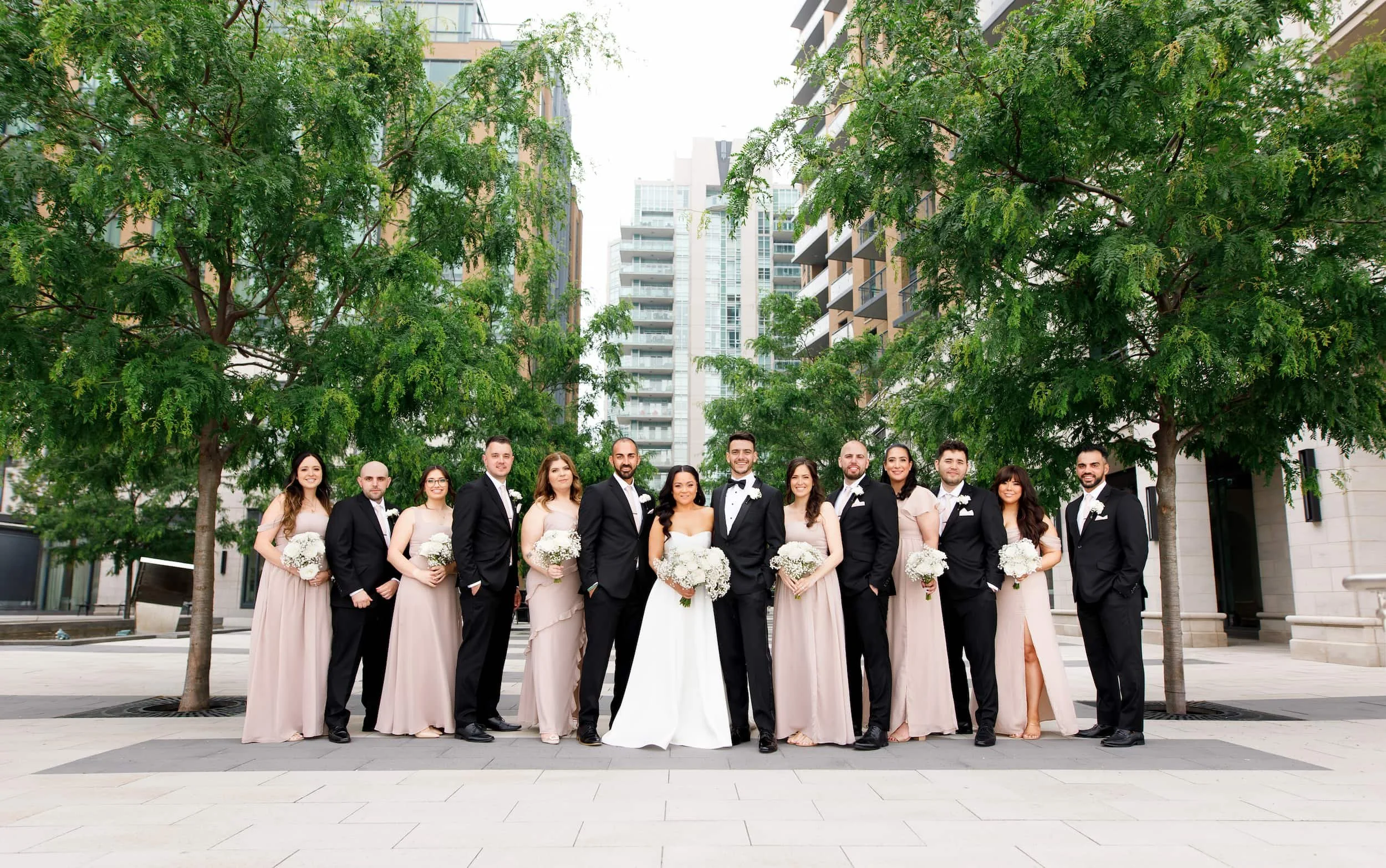Full wedding party portrait in downtown Burlington near The Pearle Hotel & Spa in Ontario