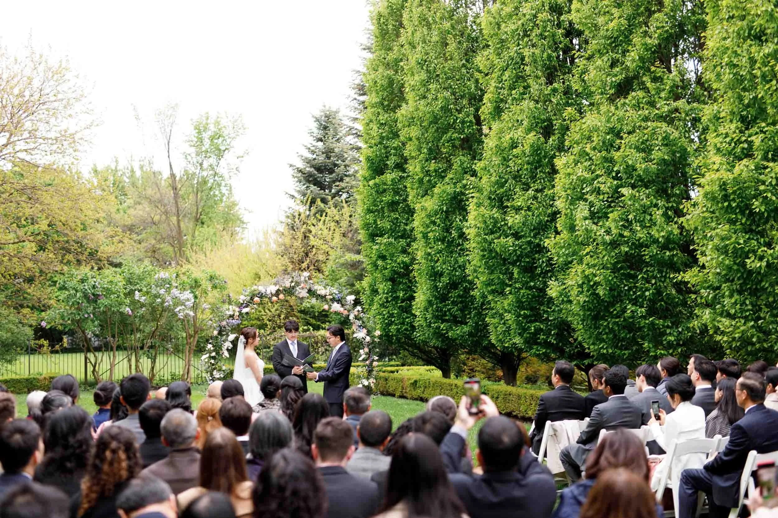 Outdoor garden ceremony at Graydon Hall Manor