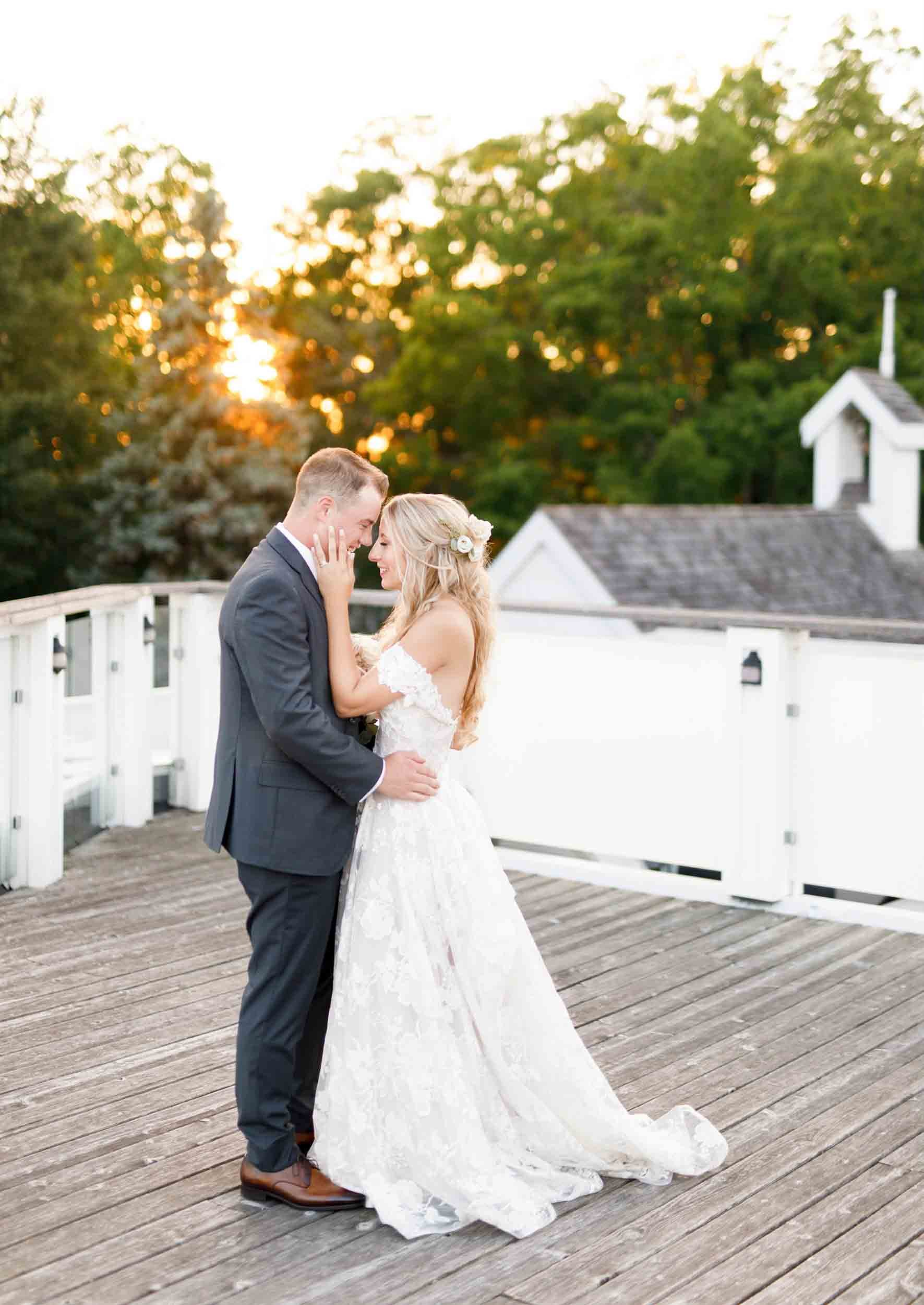 Golden hour portrait on wooden bridge at The Doctor’s House wedding in Kleinburg, Ontario