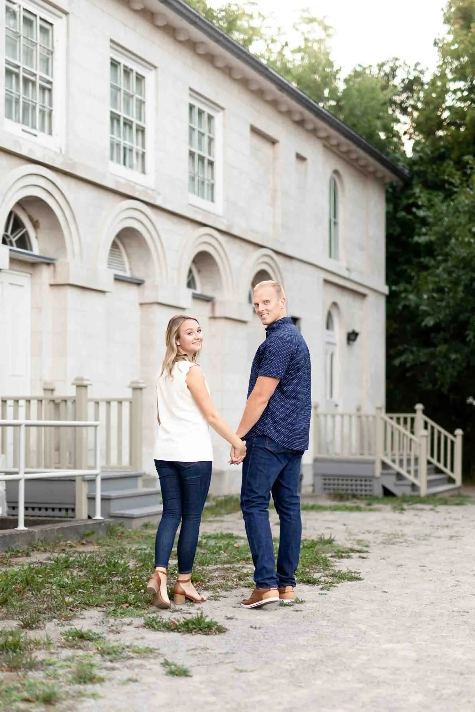 Engagement session along Dundurn Castle façade in Hamilton