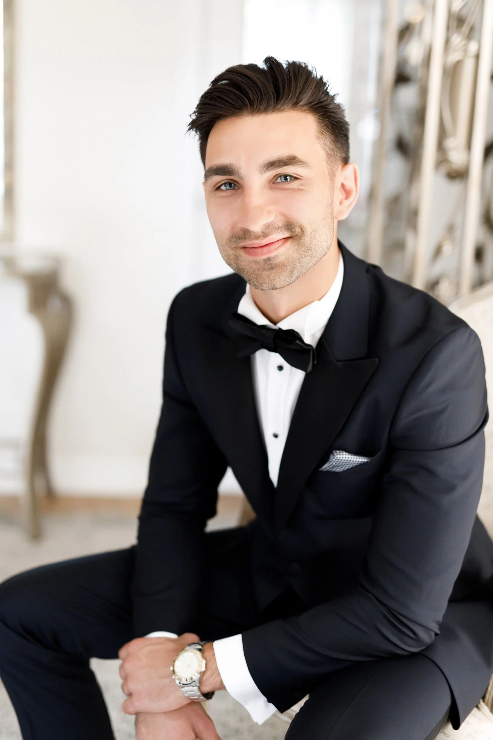 Groom portrait in black tuxedo during a Croatian wedding celebration in St. Catharines, Niagara Region