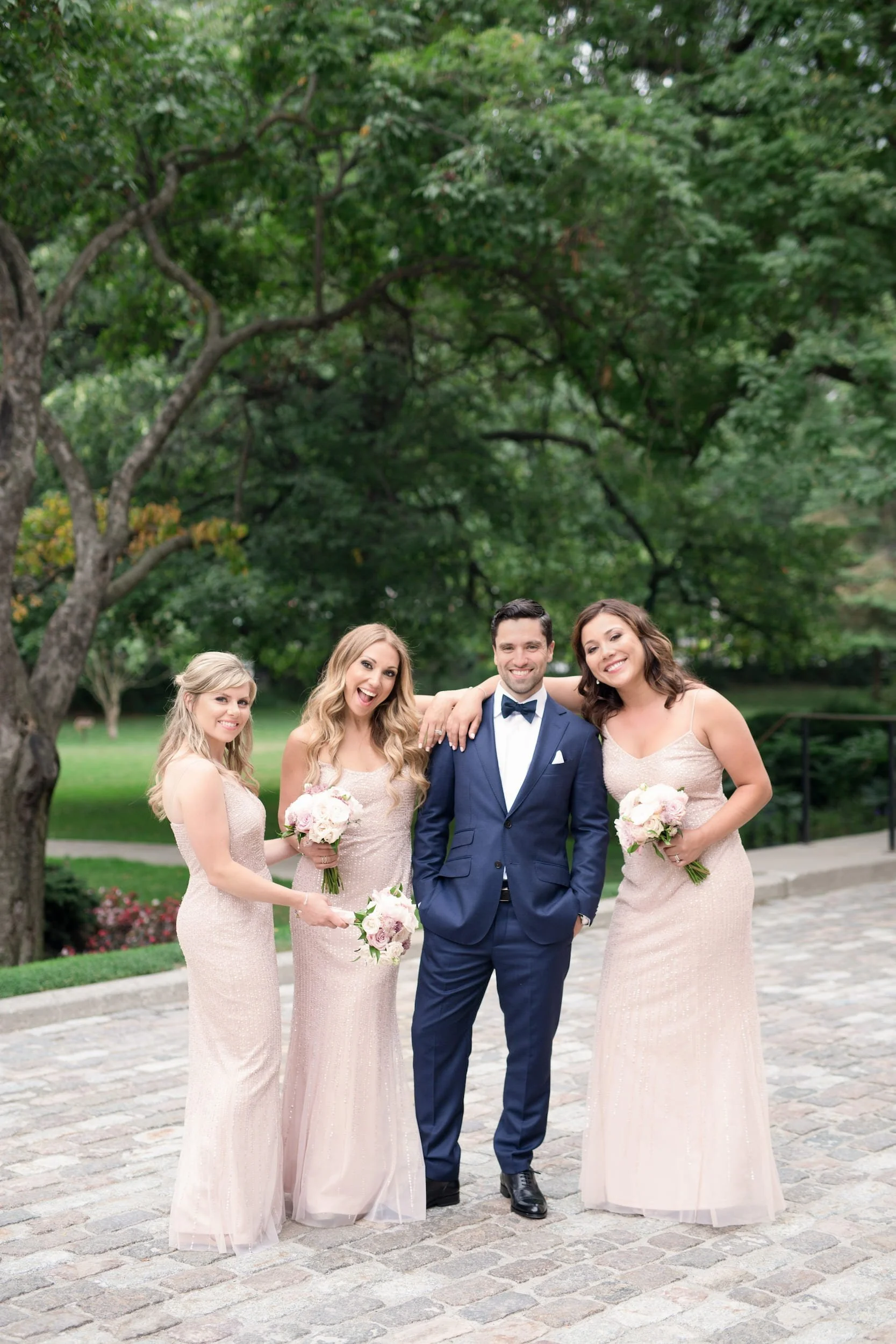 Wedding party portrait in Osgoode Hall garden courtyard