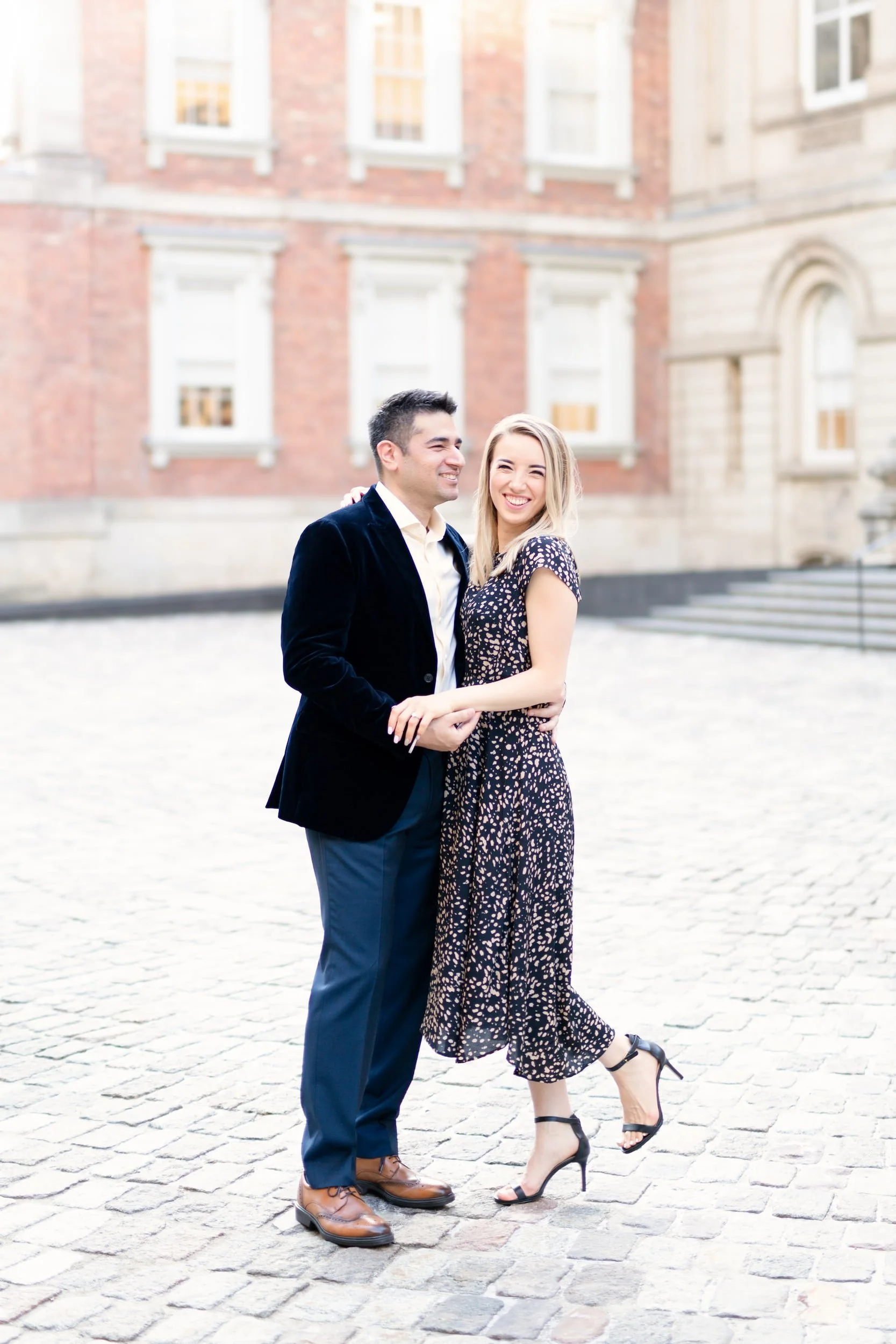 Engagement portrait in historic courtyard at Osgoode Hall near Queen Street West